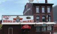 Buffalo wings do not come from American bison.  Rather, the tasty appetizer originated in Buffalo, New York, in a local pub called The Anchor Bar.