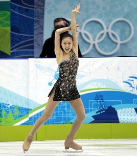 Korea's Yu-Na Kim skates into first place at the Olympic short program in Vancouver. Photos: United Press International Korea's Yu-Na Kim skates into first place at the Olympic short program in Vancouver. Photos: United Press International