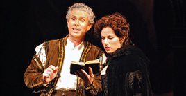 Leporello and Elvira share a few confidences.