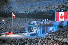 Canadian Mounties hoist the flag at the Olympic opening ceremony. Winter Olympics, opening ceremony
