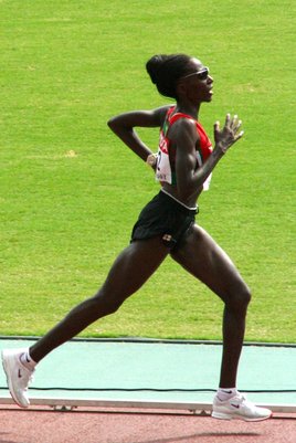 Catherine Ndereba races to her second marathon World Championship title. Photo by Eckhard Pecher. Catherine Ndereba