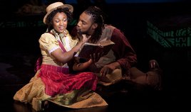 Treemonisha (JoAnna Ford) tries to teach Remus (Murvyn T. Cannaday II) to read. Treemonisha (JoAnna Ford) tries to teach Remus (Murvyn T. Cannaday II) to read.