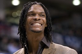 Toronto Raptors' Chris Bosh smiling during the second half of an NBA basketball game against the New York Knicks, in Toronto. (Photo: Associated Press) Toronto Raptors' Chris Bosh smiling during the second half of an NBA basketball game against the New York Knicks, in Toronto. (Photo: Associated Press)