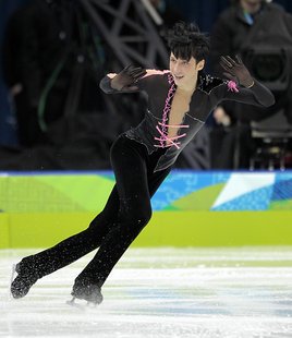 Johnny Weir of the United States performs his short program in the men's figure skating at the 2010 Winter Olympics. (United Press International)