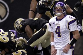Minnesota Vikings quarterback Brett Favre (4) reacting after fumbling the ball, which was recovered by the New Orleans Saints during the second quarter of the NFC Championship NFL football game in New Orleans. (Photo: Associated Press)