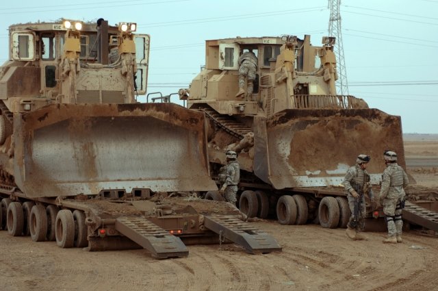 Heavy equipment has been spotted heading toward the Alabama bunker site where a small boy is still being held hostage.