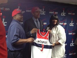 Bradley Beal, the Washington Wizards' No. 3 pick in Thursday's draft, stands for photos with his parents. (Nicolas Nightingale/The Washington Times)