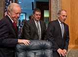 Sen. Joseph I. Lieberman (left), Connecticut independent, takes his seat as FBI Associate Deputy Director Kevin Perkins (center) and National Counterterrorism Center Director Matthew G. Olsen arrive to testify on homeland threats and agency responses in front of the Homeland Security and Governmental Affairs Committee on Capitol Hill in Washington on Wednesday, Sept. 19, 2012. (Andrew Harnik/The Washington Times)
