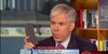 David Gregory holding a 30-round magazine at NBC's Washington bureau (NBC/Meet the Press)