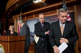 Senate Majority Whip Sen. Richard J. Durbin (above right) leads Sen. Charles E. Schumer, Senate Majority Leader Harry Reid and Sen. Patty Murray out of a news conference after announcing that last-ditch efforts to avert spending cuts had failed. (Associated Press)