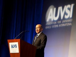 ** FILE ** Michael Huerta, administrator of the Federal Aviation Administration, speaks as one of the keynote speakers at the Association for Unmanned Vehicle Systems International, North America 2012 conference inside the exhibition hall of the Mandalay Bay hotel-casino in Las Vegas, Nev., on Tuesday, Aug. 7, 2012. (Martin S. Fuentes/Special to The Washington Times)