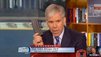 NBC News' David Gregory holds up 30-round magazine on "Meet the Press" in Washington, D.C.