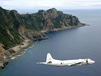 The Japan Maritime Self-Defense Force patrols the Senkaku Islands, which China calls the Diaoyu Islands, in the East China Sea. China is trying to strengthen its claim on tiny, uninhabited, Japanese-controlled islands by raising questions about the much larger Okinawa chain that is home to more than 1 million Japanese along with major U.S. military installations. Tokyo has issued a "stern protest." (Associated Press)