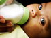 **FILE** In this 2003 file photo, a baby is fed by her mother at the teen pregnancy program offered at the Upper Cordoza Clinic. (The Washington Times)