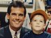 Five-year-old Drew Storen sits on the lap of his father Mark, a sportscaster.  Baseball and other sports were a major part of their lives as Drew was growing up and on his way to becoming a relief pitcher for the Nationals.