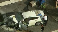 Raw: Car Jumps Curb in NYC, Injures 8