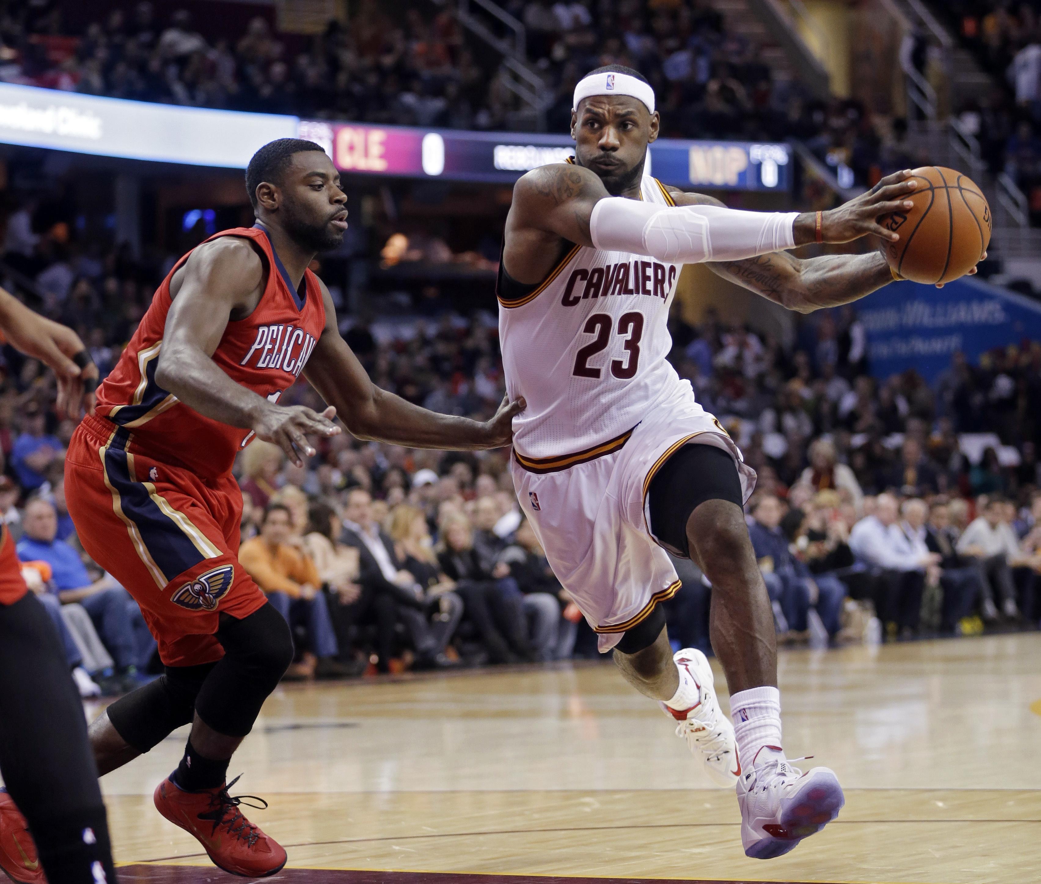 The Cleveland Cavaliers' LeBron James (23) works to the basket in