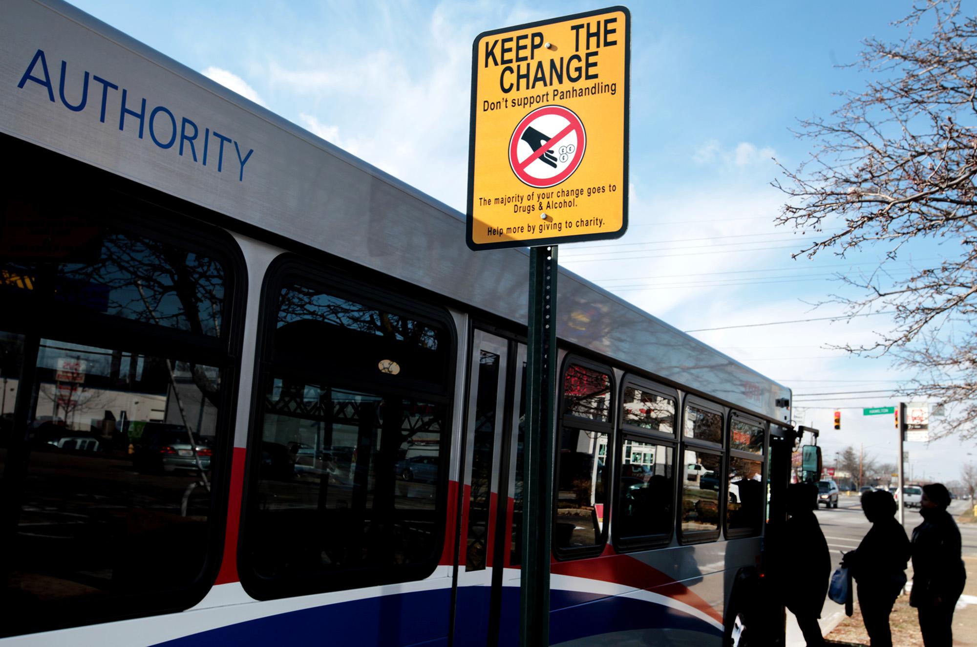 Signs ask drivers give to charity, not panhandlers