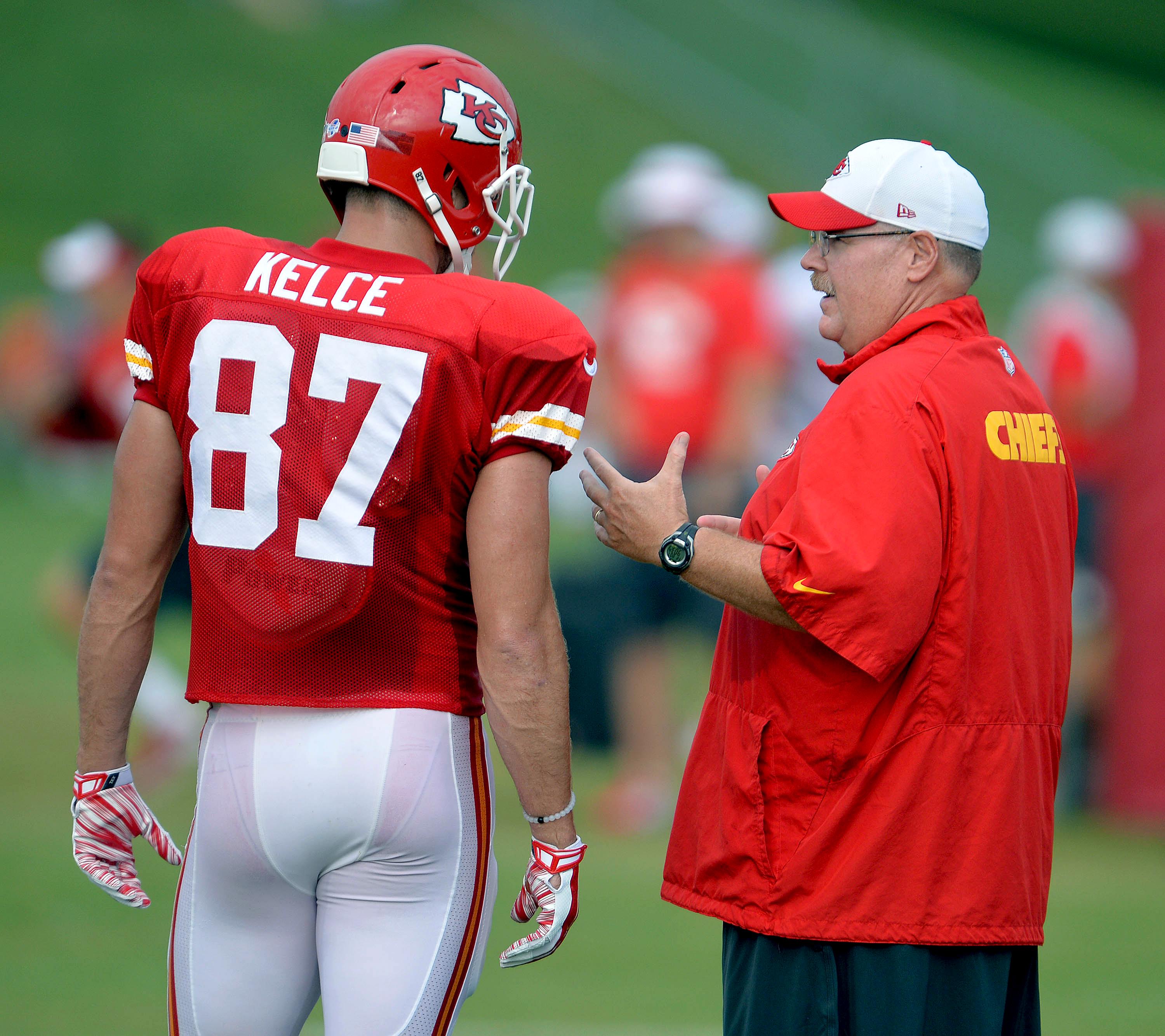 Kansas City Chiefs Head Coach Todd Haley talks to RB Jamaal