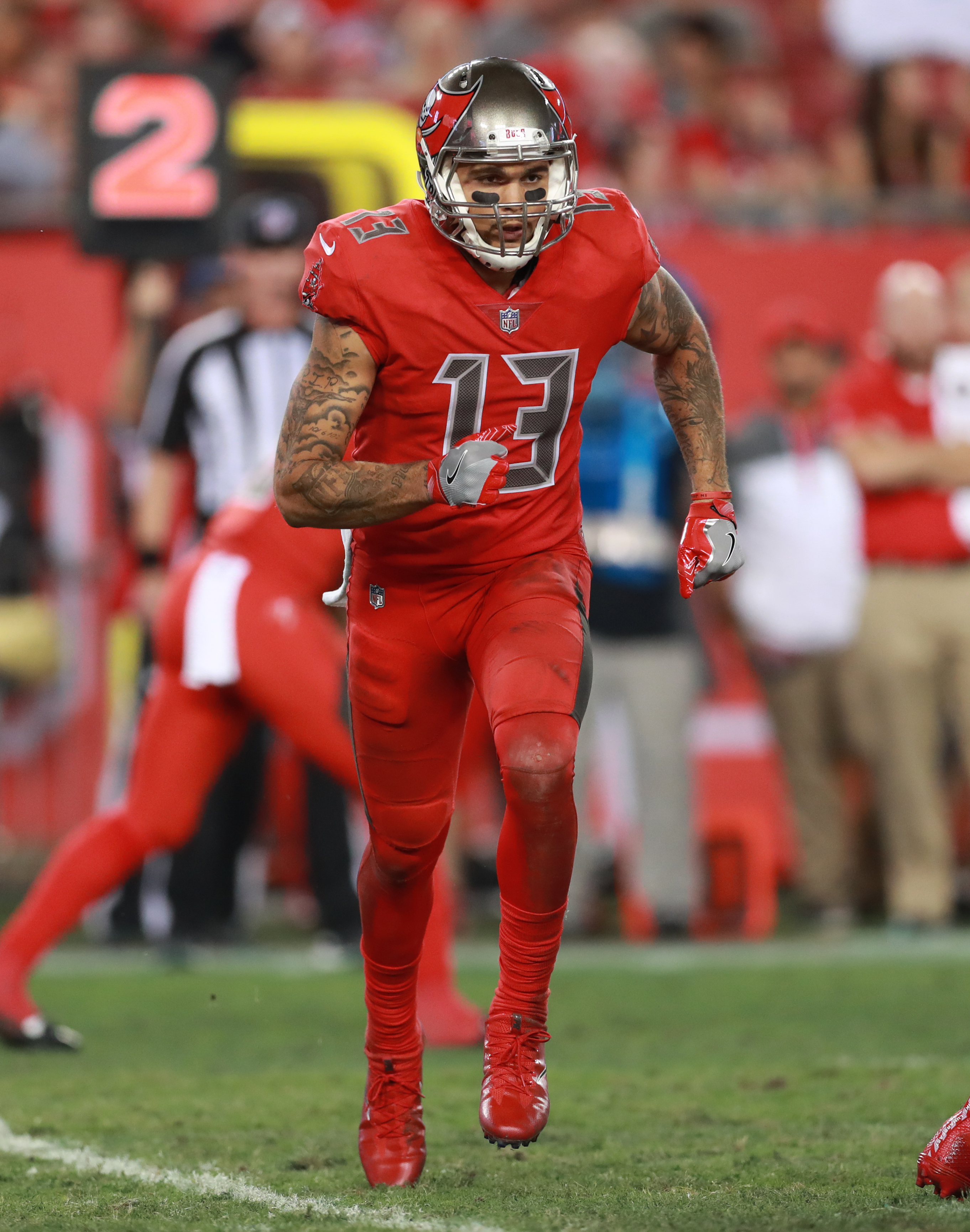 Mike Evans: NFL star sits during anthem in Donald Trump protest