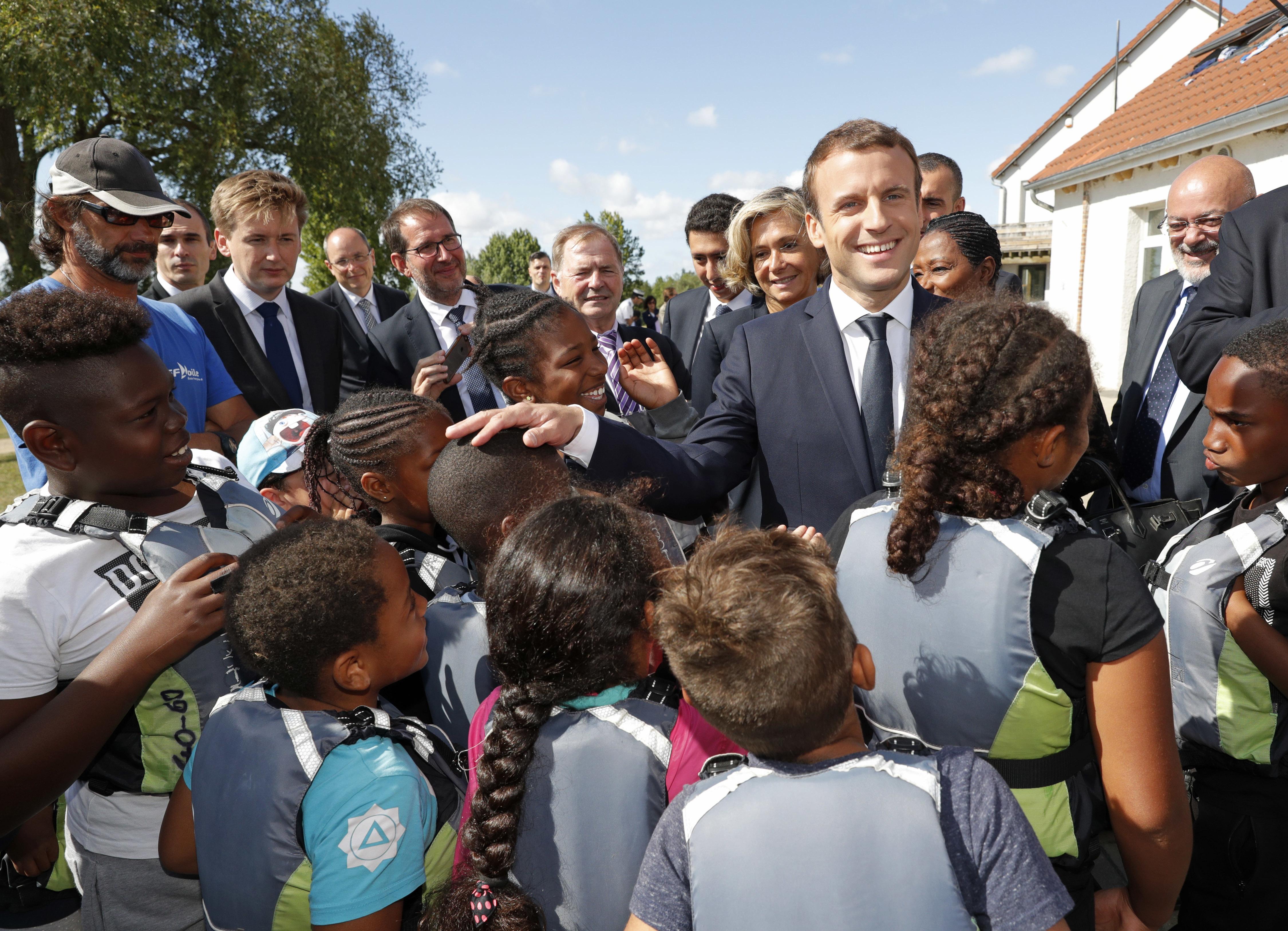 French President Visits Children At Charity Holiday Program Washington Times