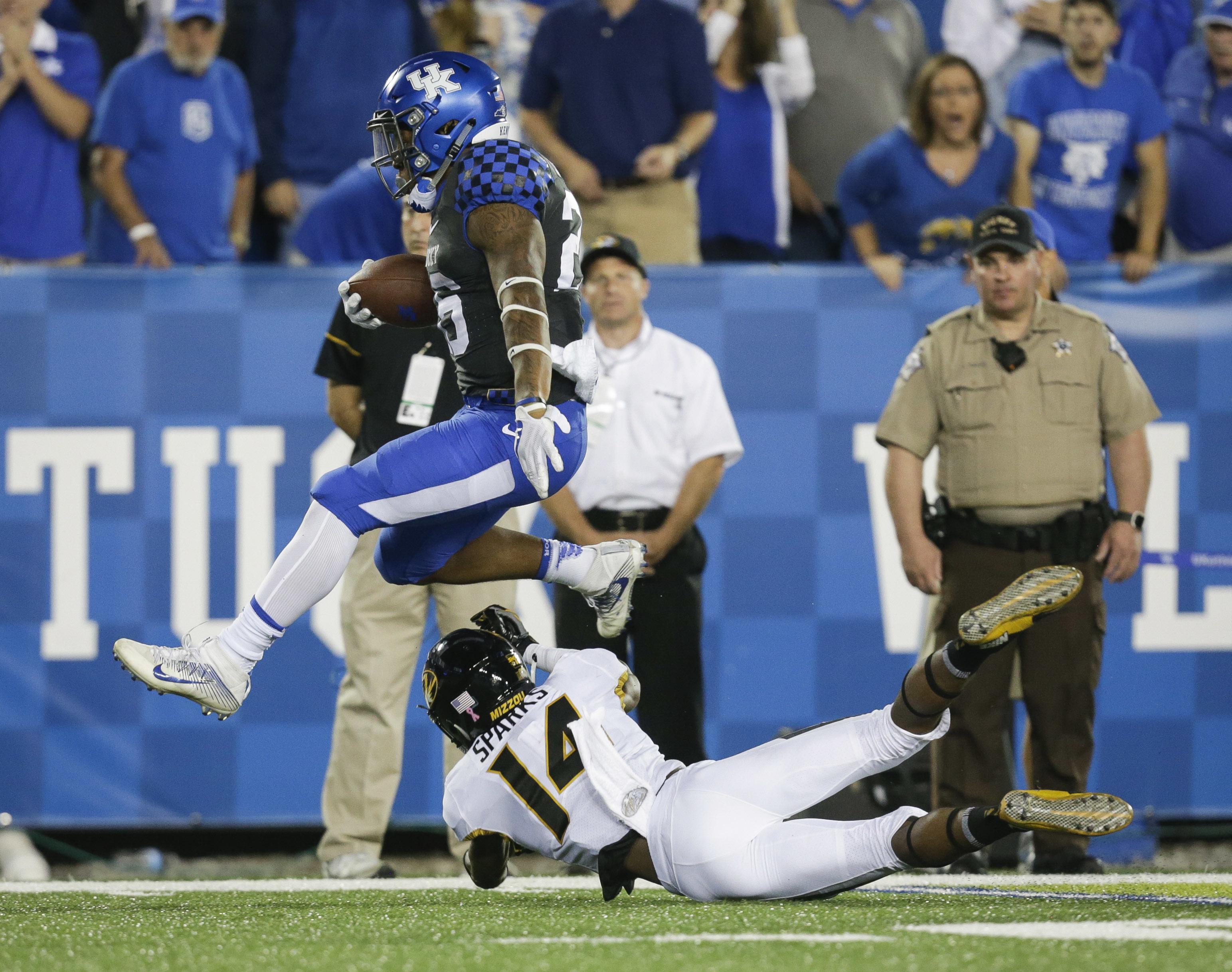 MacGinnis' 4 FGs help Kentucky survive Missouri 40-34