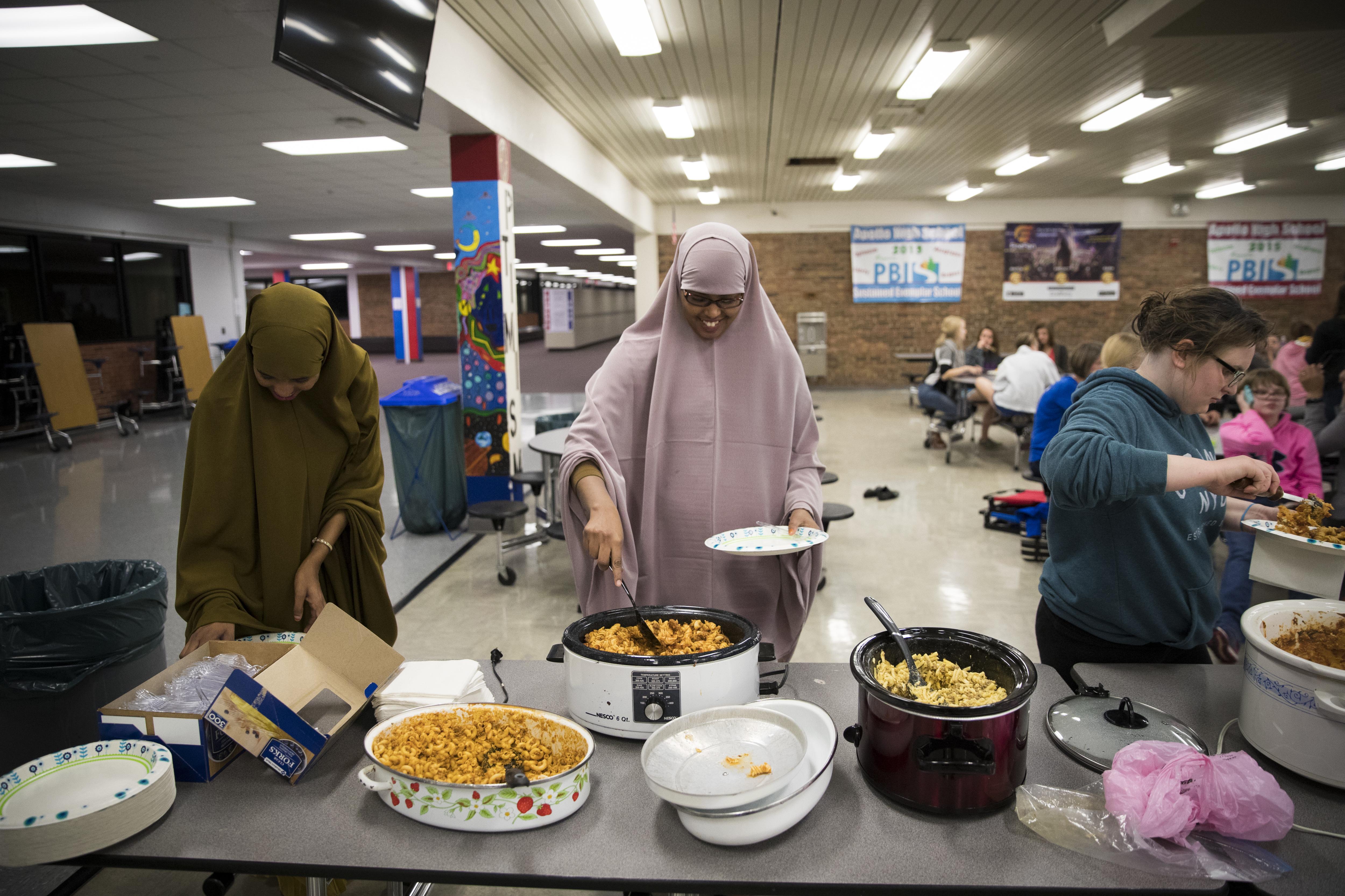 Minnesota High School Welcomes First Muslim Women Swimmers Washington Times