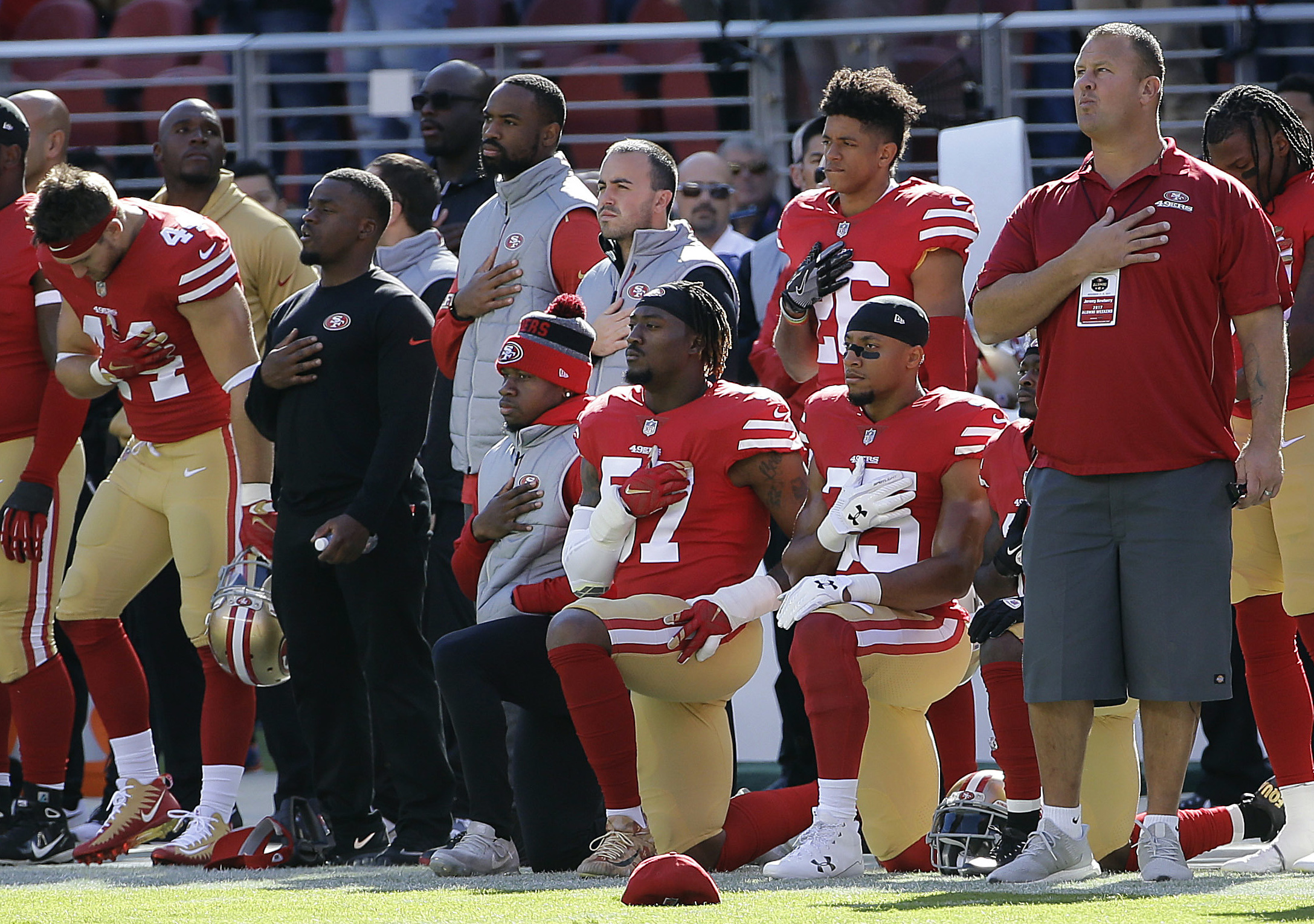 N.F.L. Anthem Protests: Players Kneel, Stand and Hear Boos - The