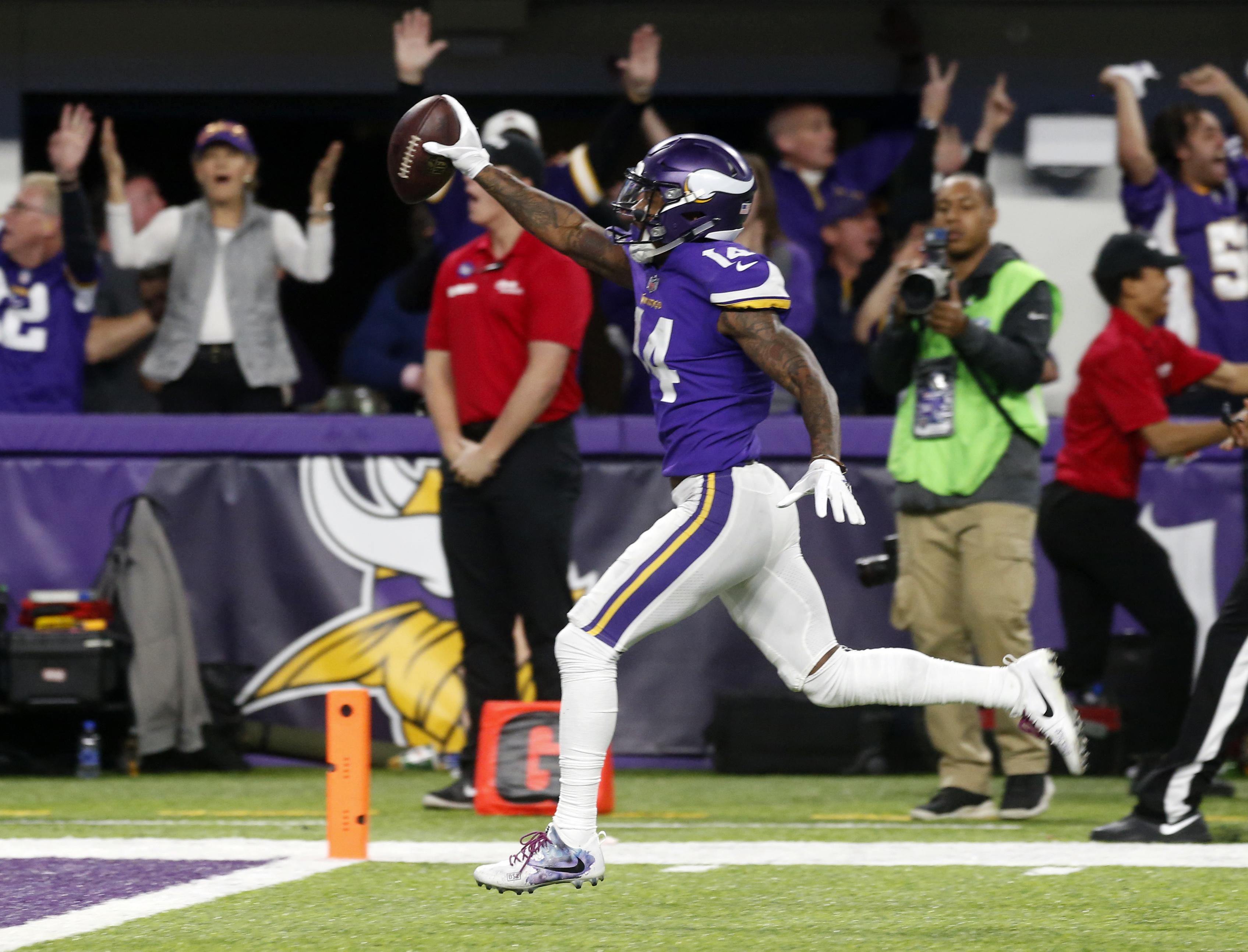 Giants outlast Vikings 31-24 for 1st playoff win in 11 years