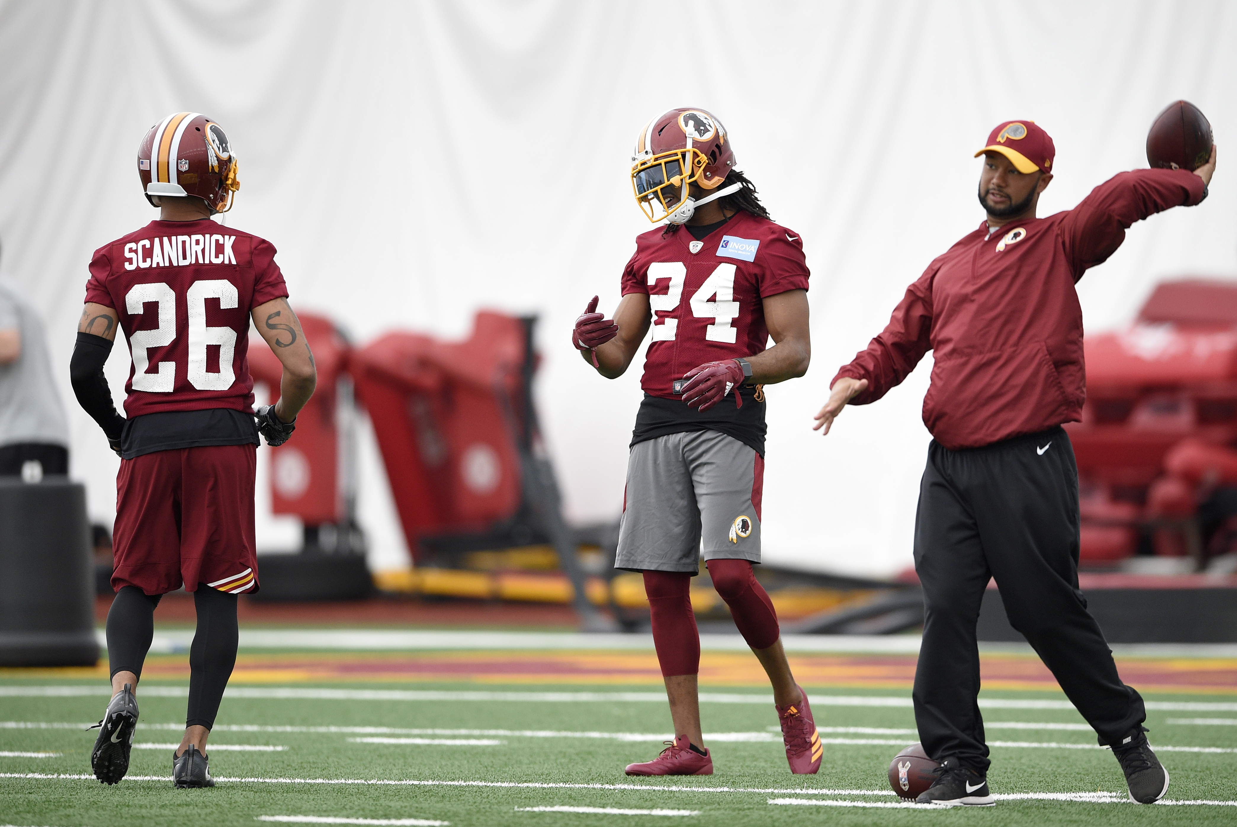 Washington Redskins' newly signed cornerback Josh Norman listens