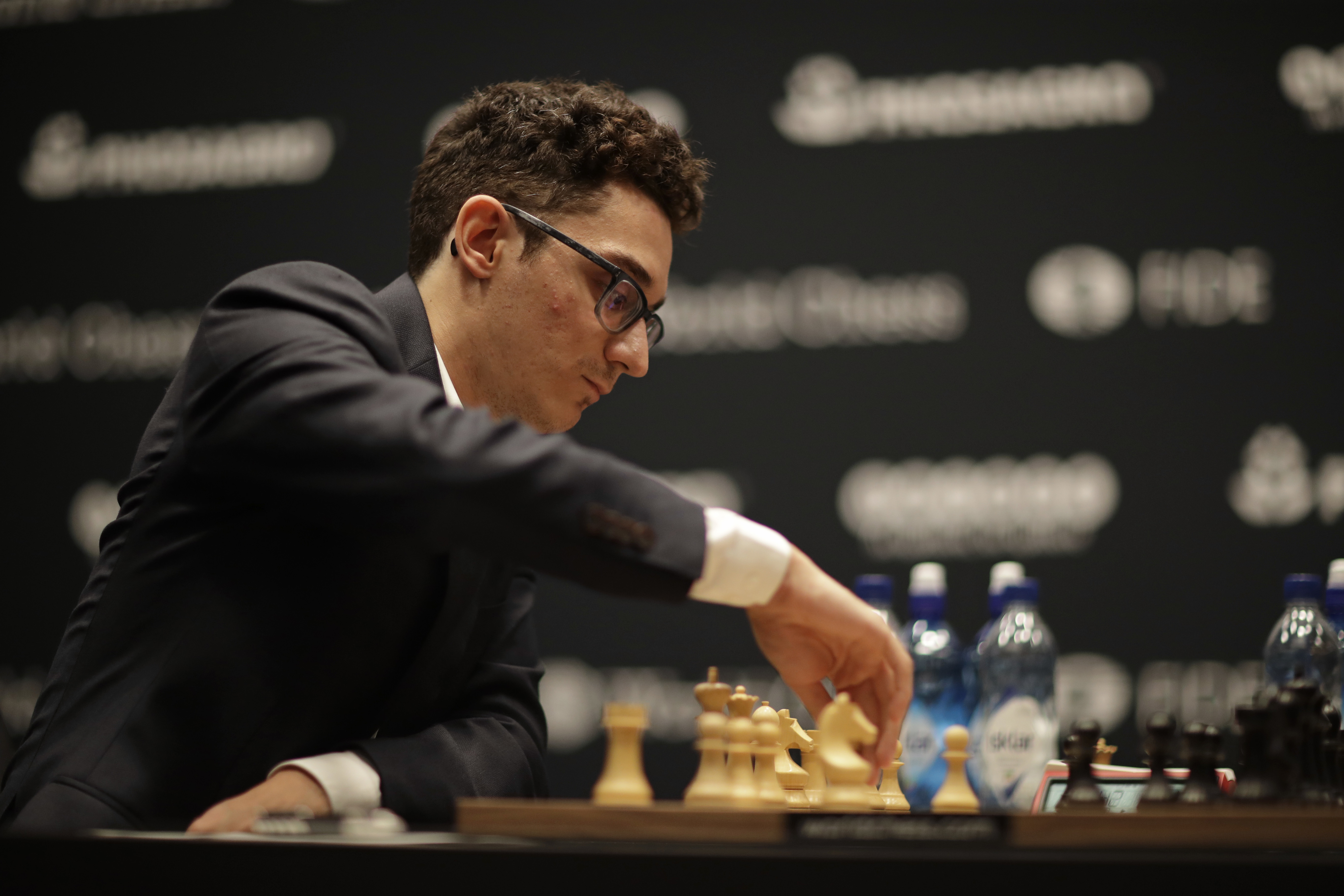 Caruana misses a Tal-like combination, but still wins in Round 8 of FIDE  Grand Swiss