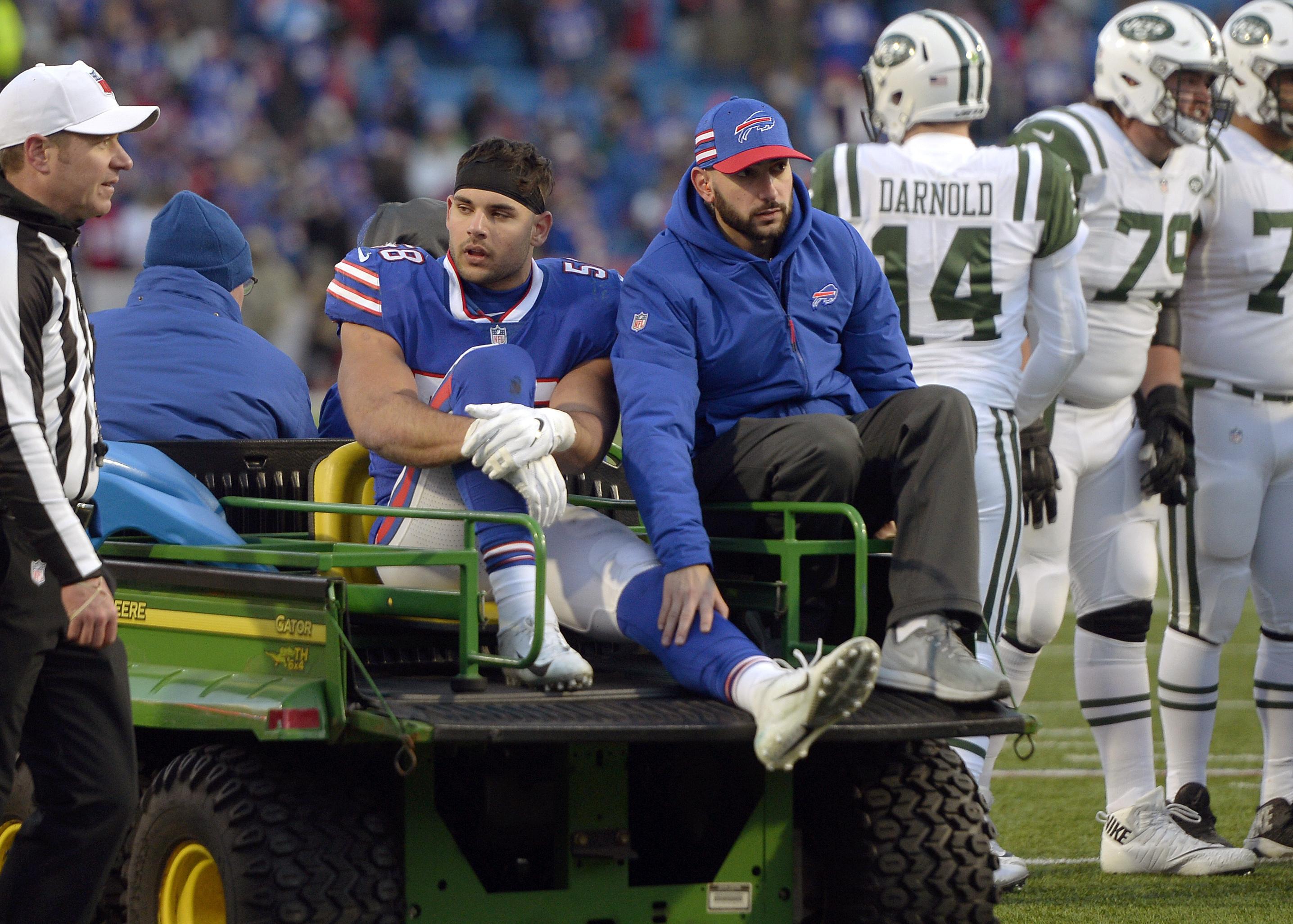 Buffalo Bills linebacker Matt Milano (58) and defensive tackle Tim