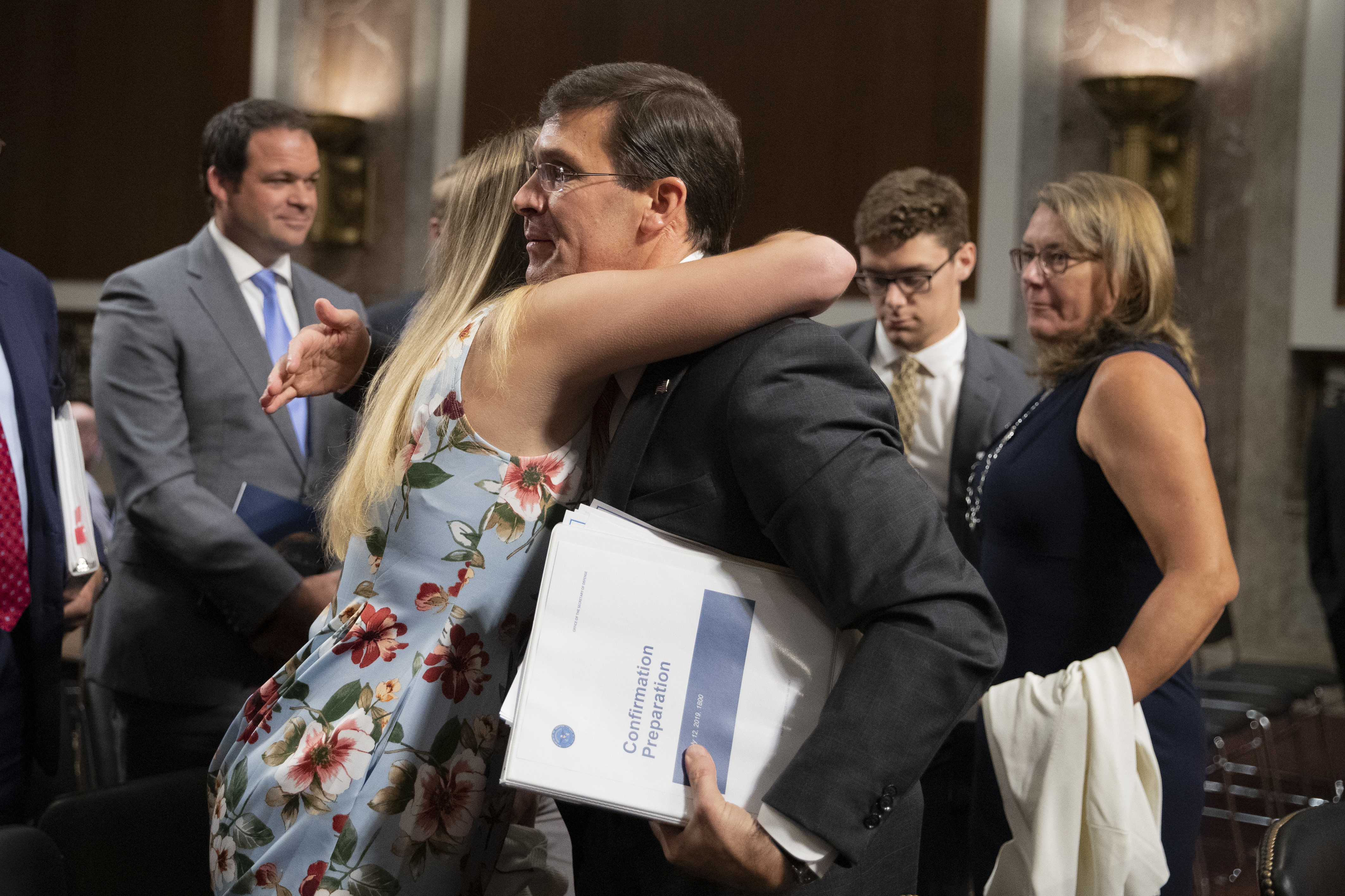 Dr. Mark Esper stands with his wife Leah prior to his swearing in as United  States Secretary of Defense in an Oval Office ceremony at the White House  in Washington, DC, U.S.