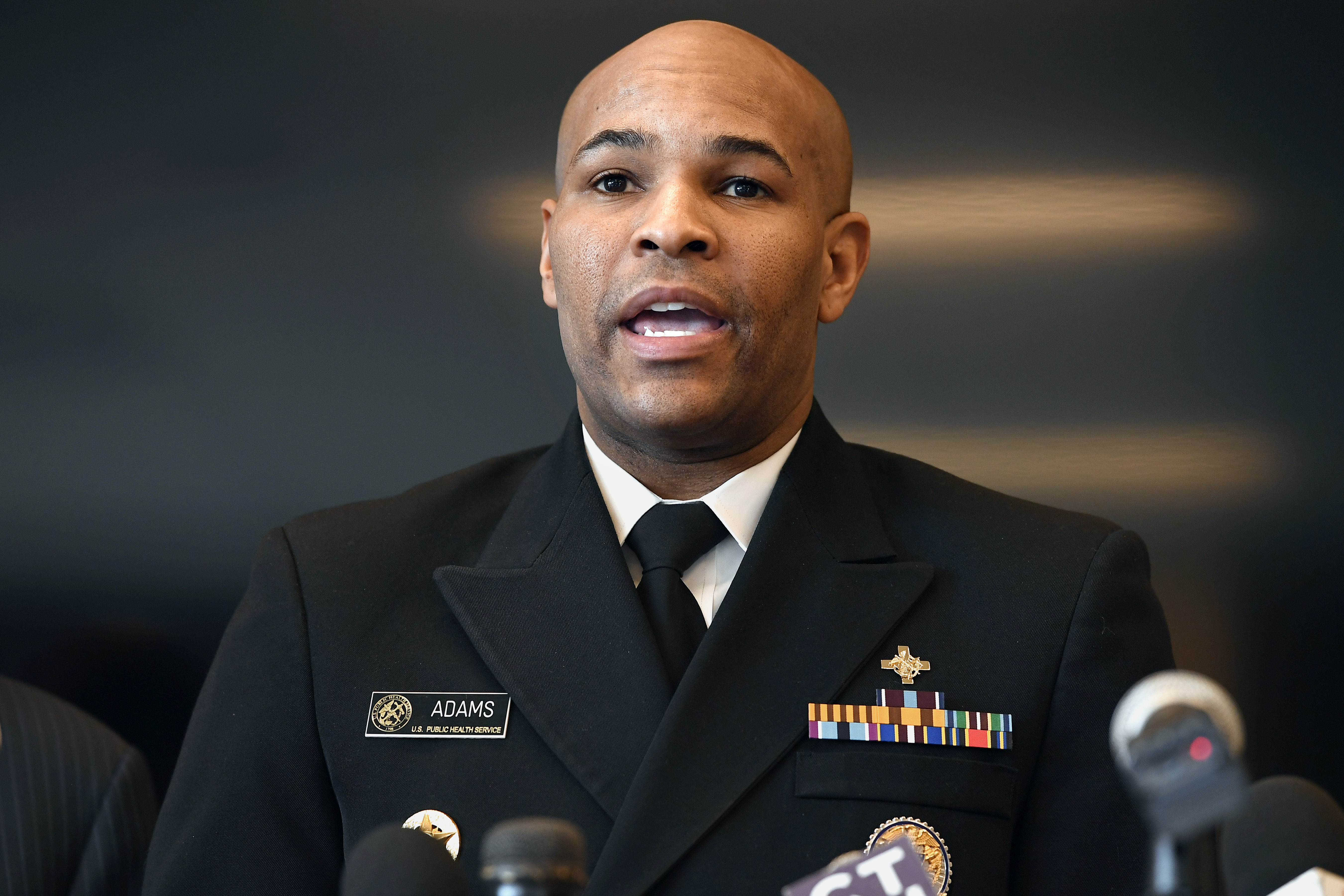 Vice Admiral Jerome M. Adams, U.S. Surgeon General, left, with Las