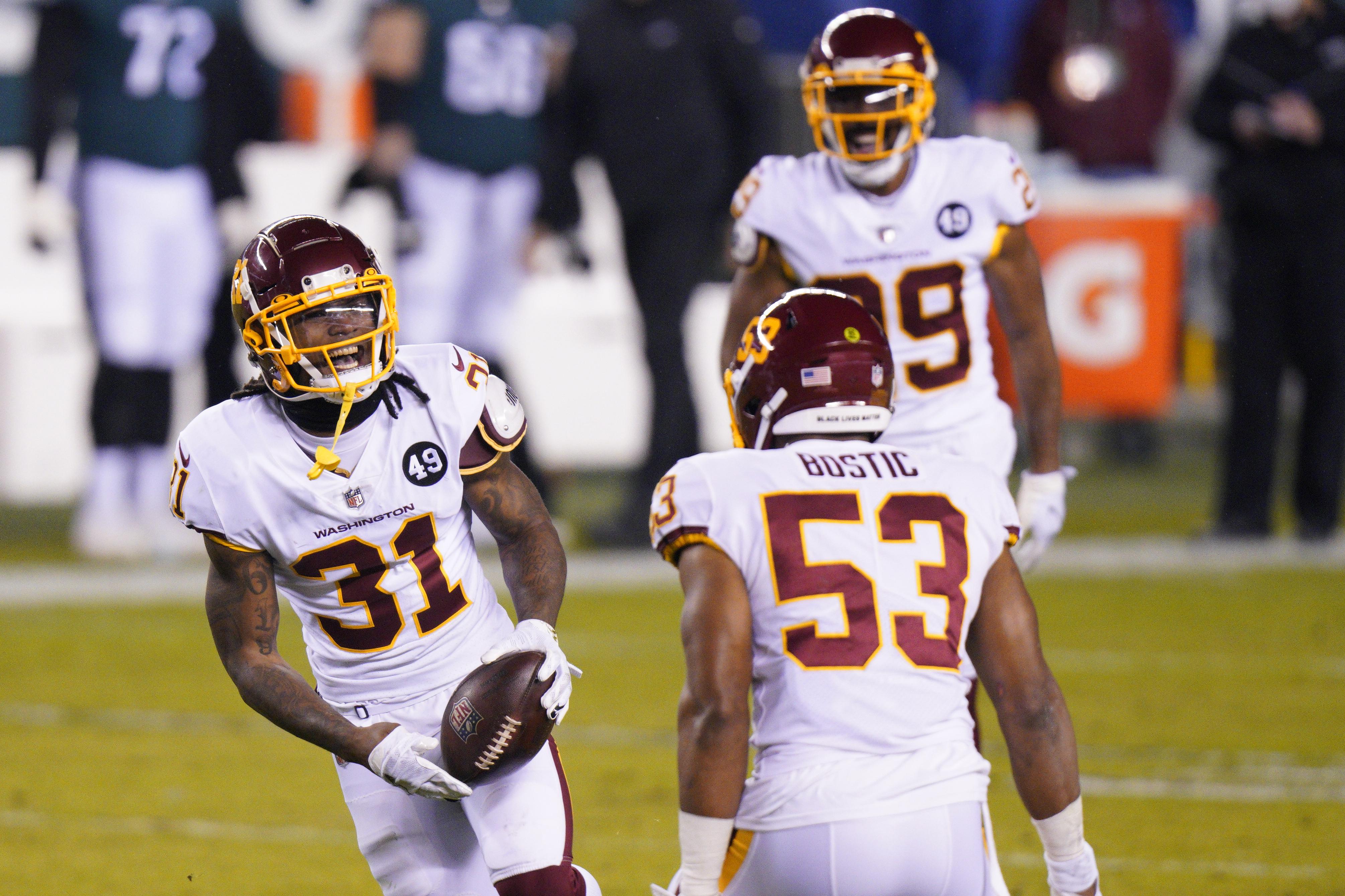 Washington Commanders defensive back Kamren Curl (31) looks to