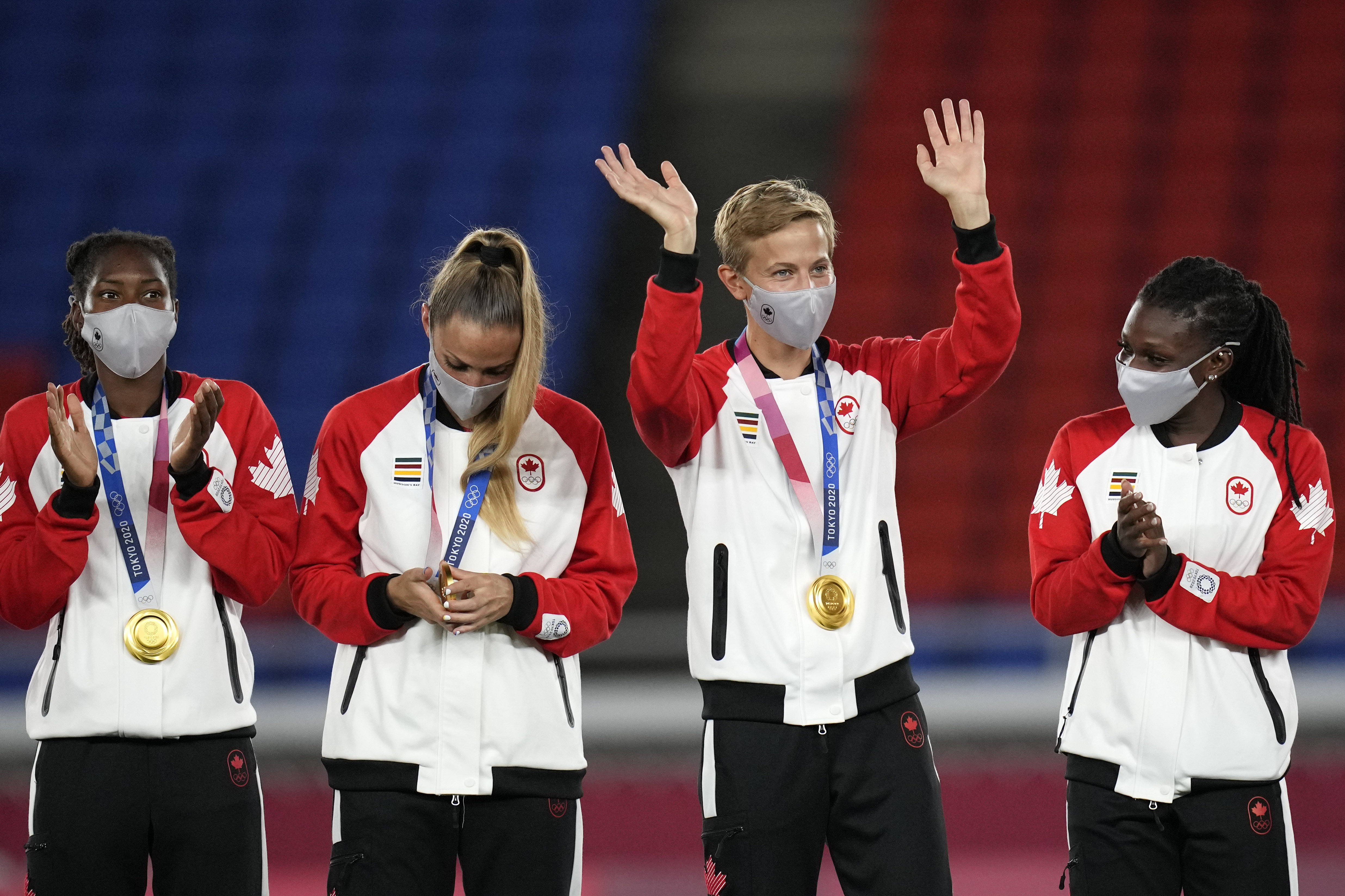 Quinn, Canadian soccer player, wins Olympic gold, makes transgender history  without uproar - Washington Times
