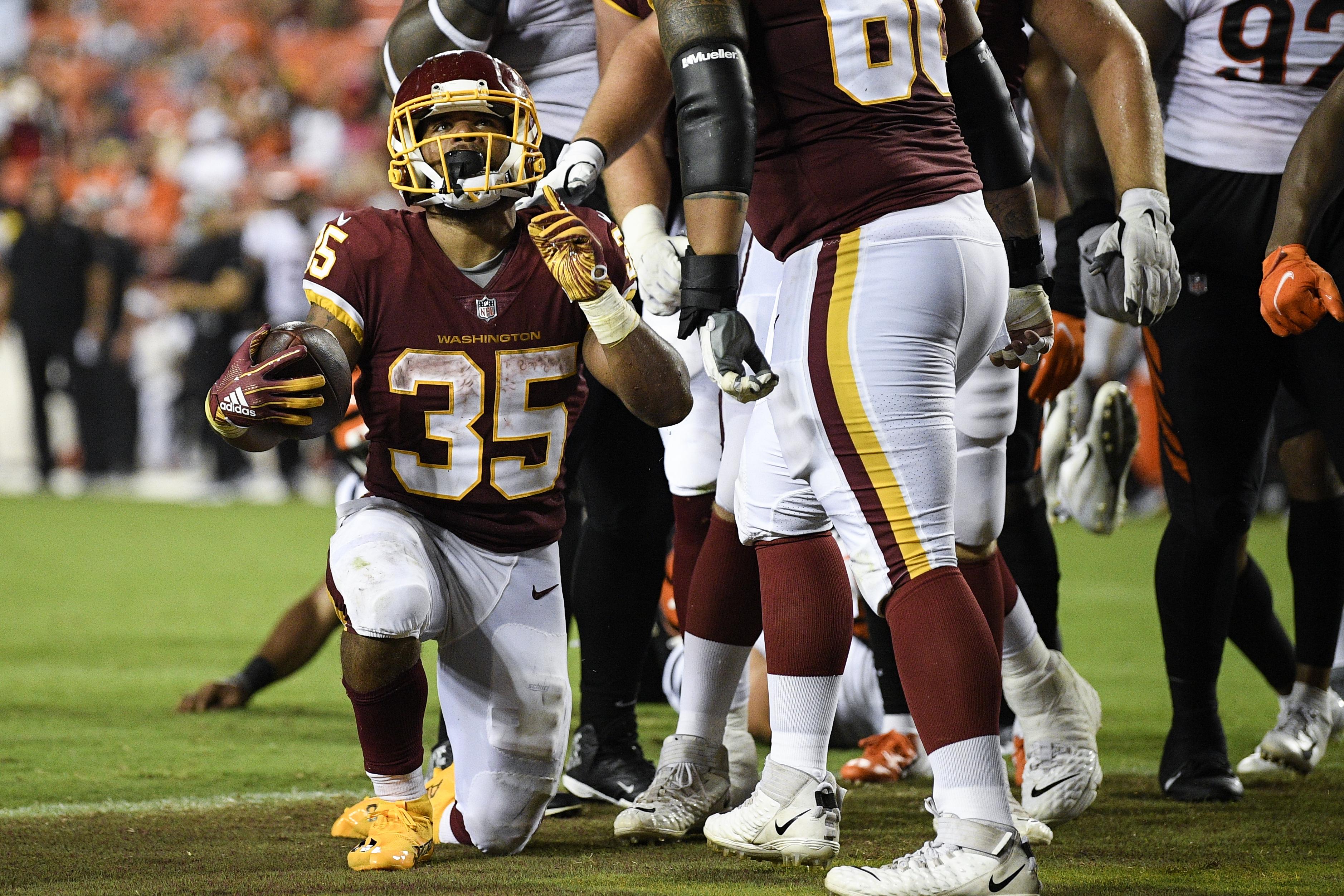 FILE ** Ray Brown of the Washington Redskins watches from the