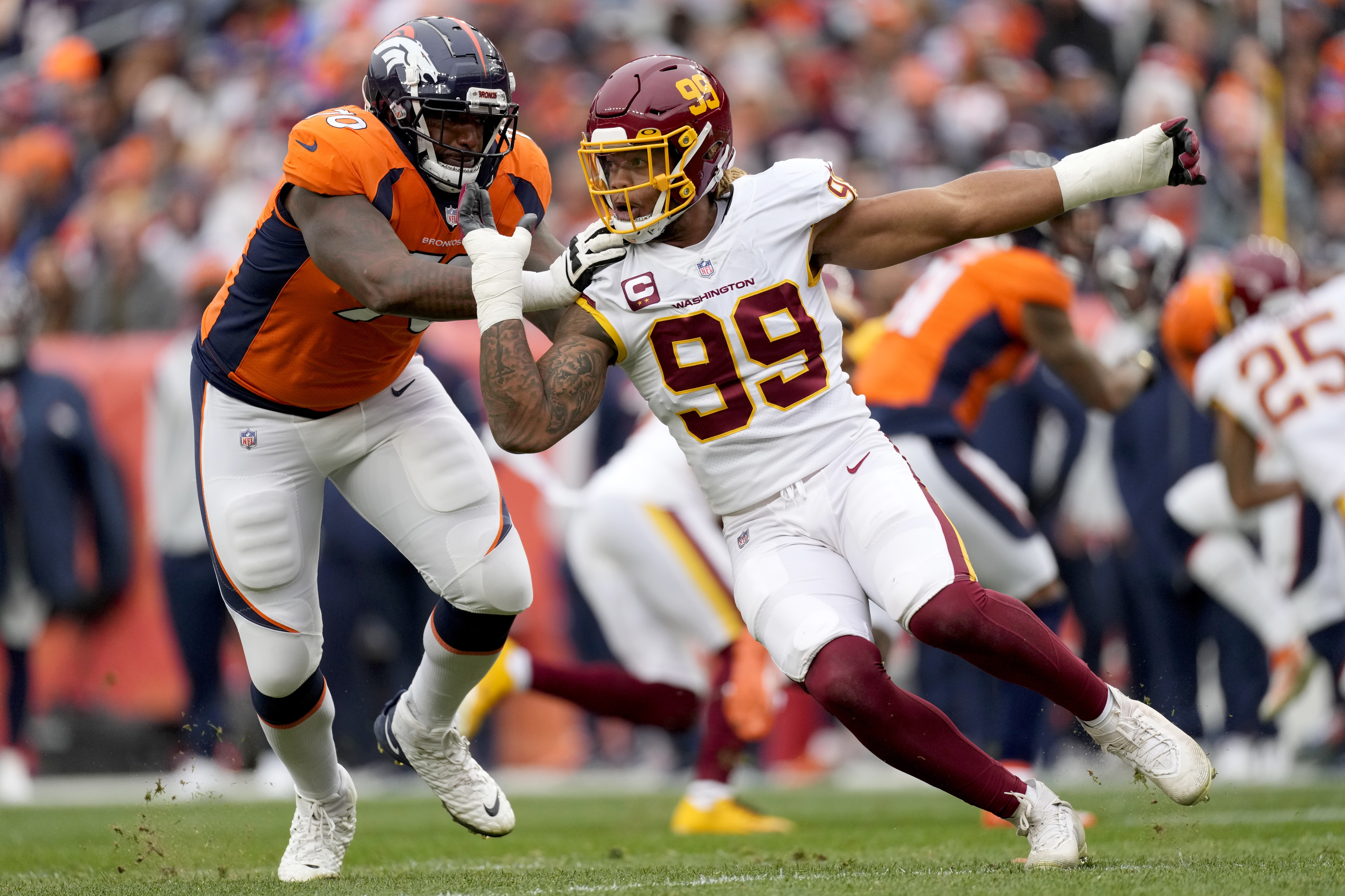 Denver Broncos offensive tackle Bobby Massie (70) gets set on the