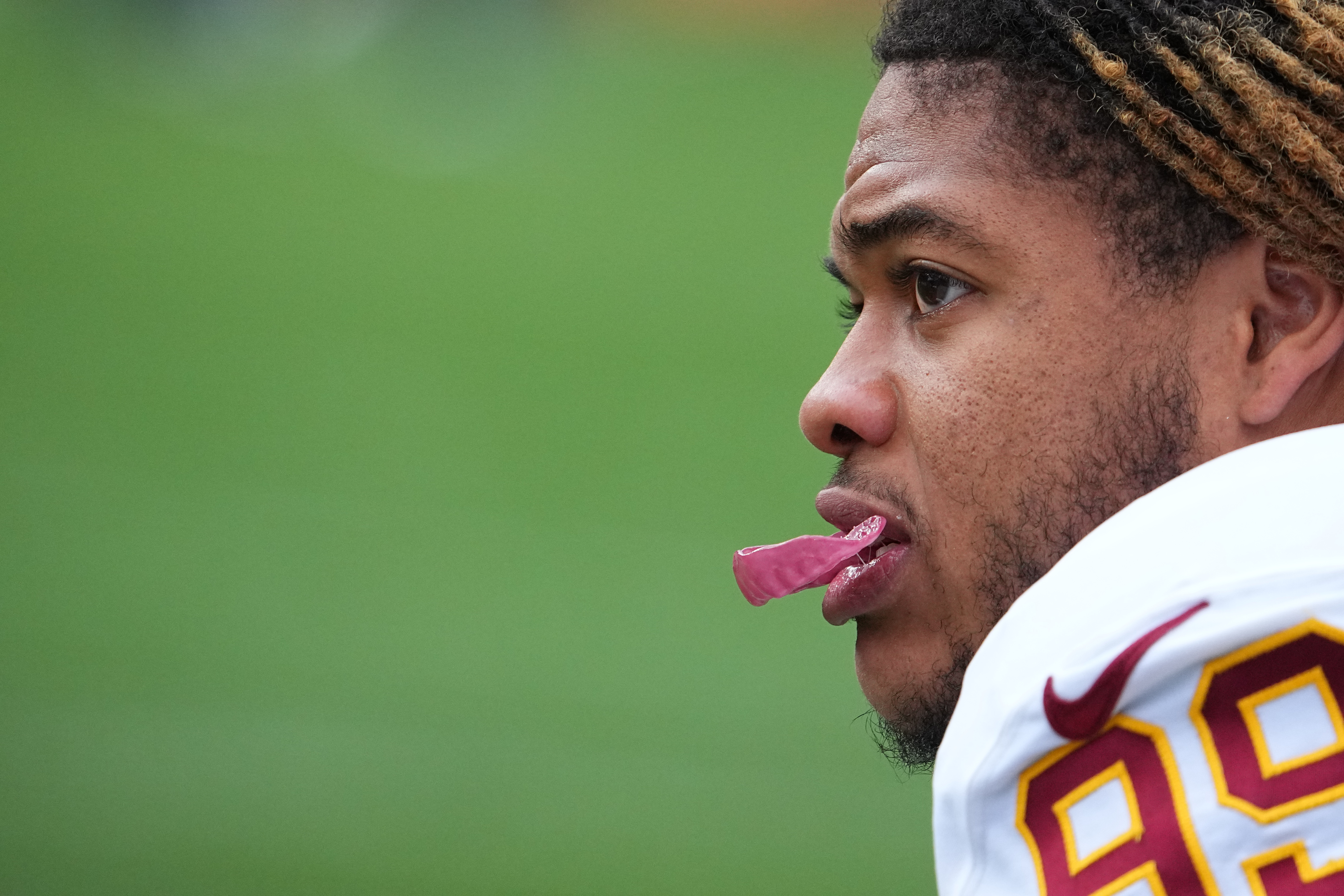 Washington Football Team defensive end Chase Young (99) warms up against  the Denver Broncos in the first half of an NFL football game Sunday, Oct.  31, 2021, in Denver. (AP Photo/Bart Young