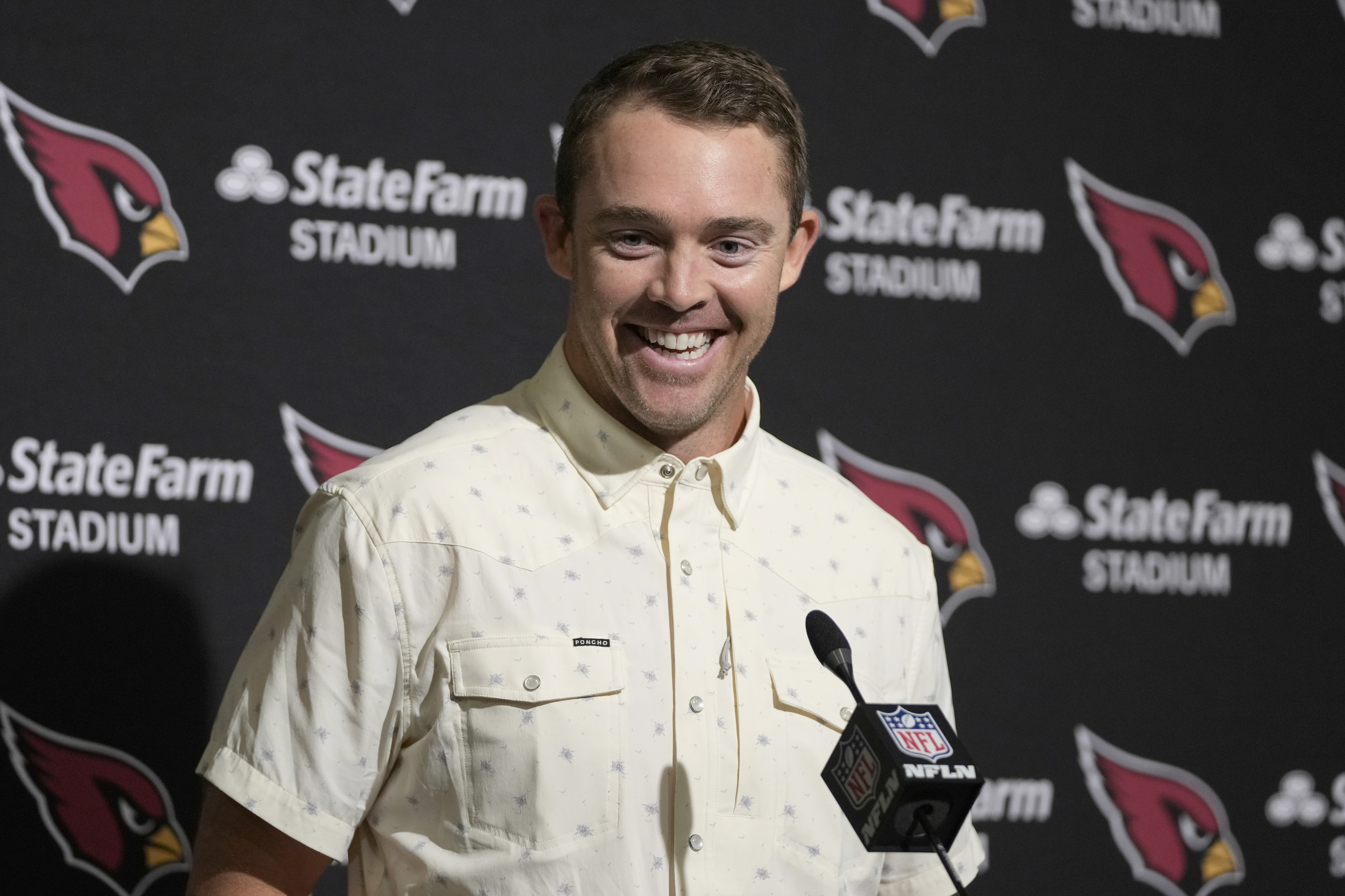 Colt McCoy steps in at quarterback to lead Cardinals to victory