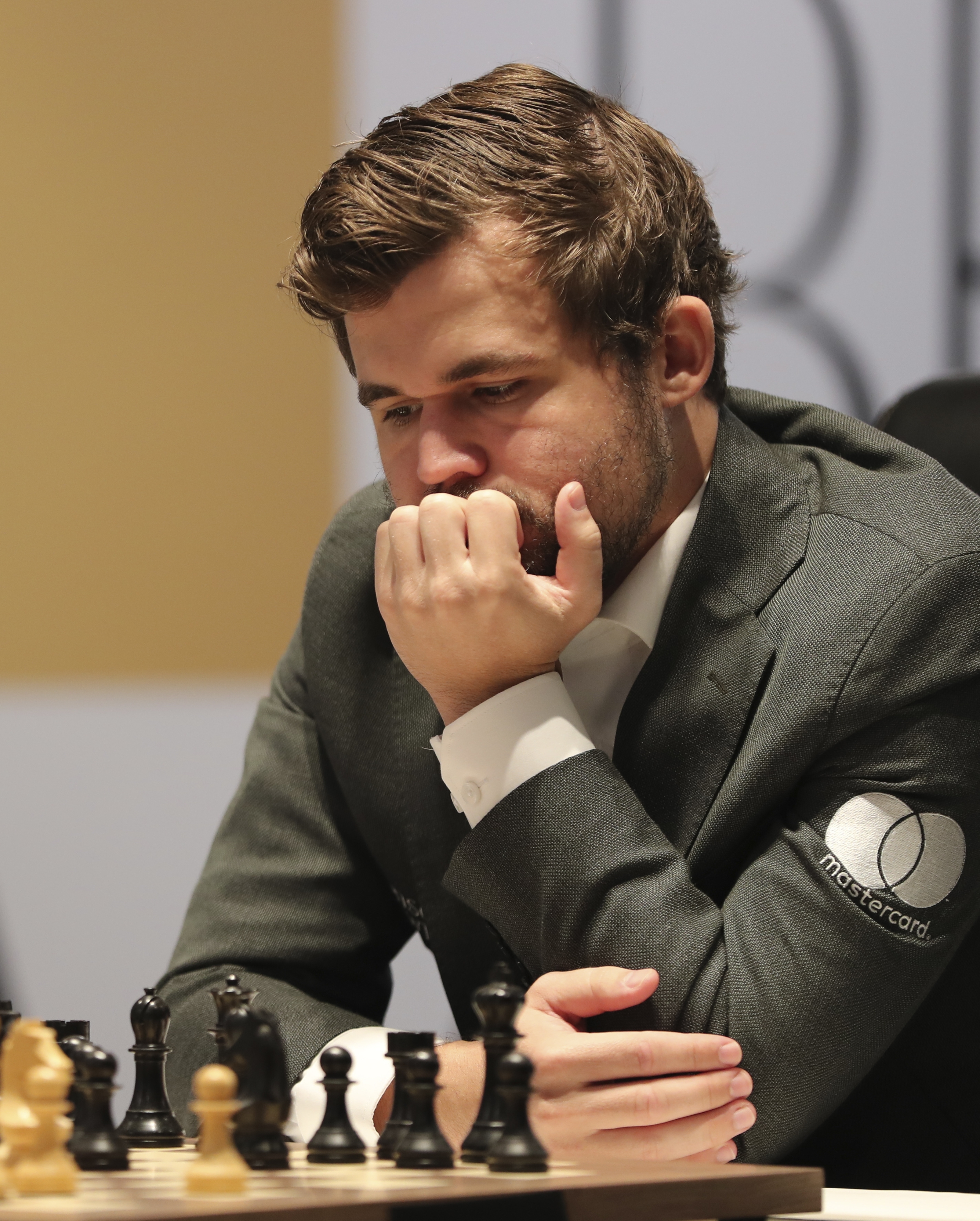 Carlsen and Nepomniachtchi draw chess world title opener after flag furore, World Chess Championship 2021