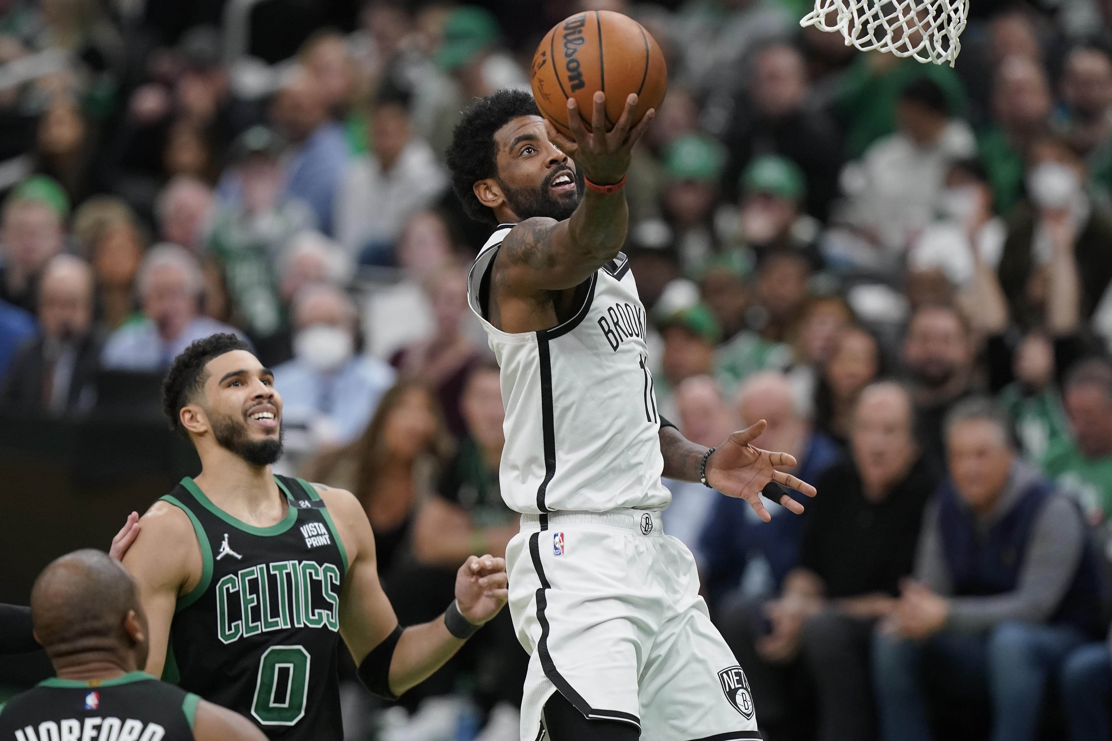 Boston fans don't get to Kyrie Irving, Celtics' defense does