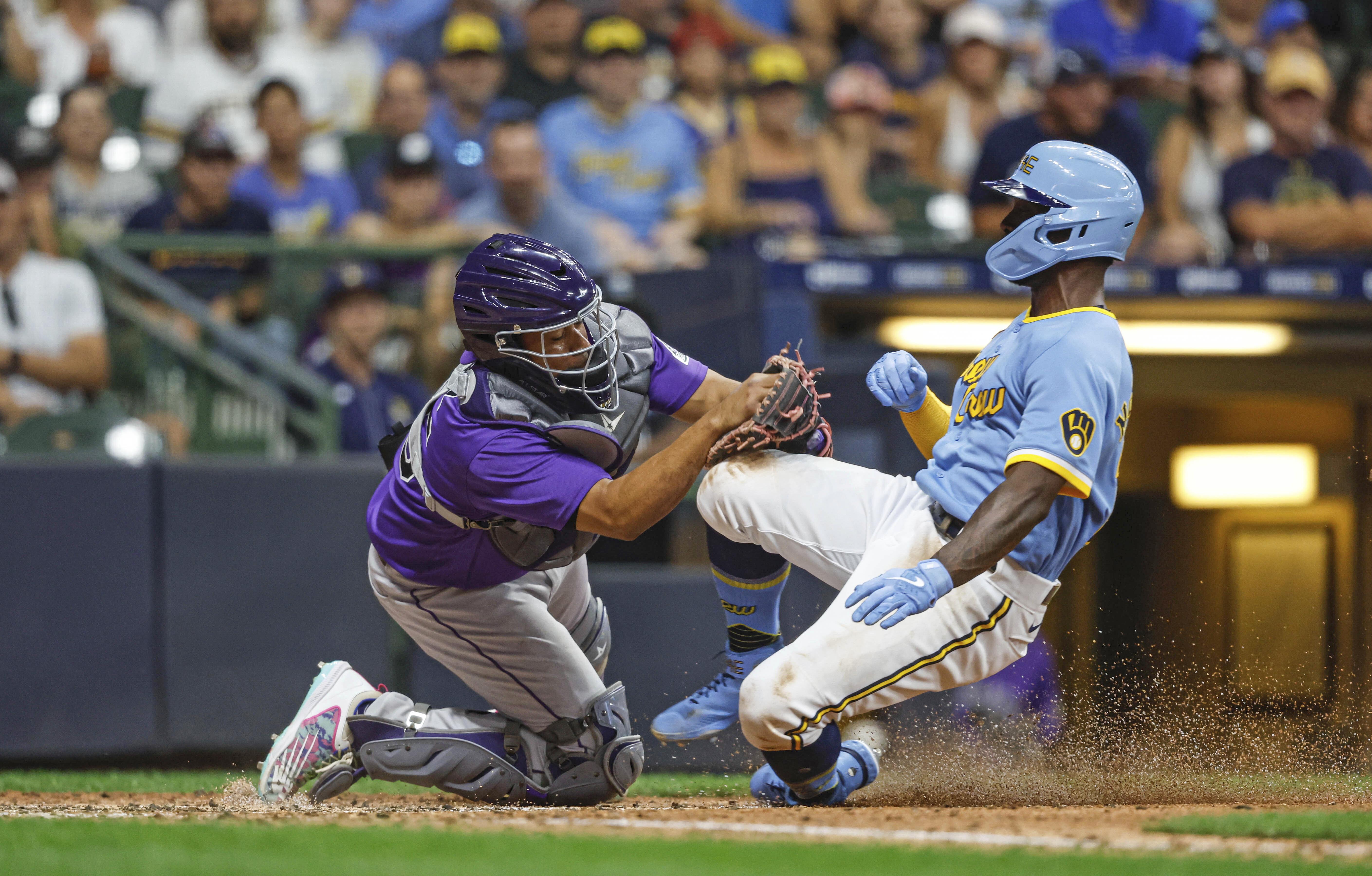 Brewers edge Rockies 6-5 in 13, extend their NL Central lead - The