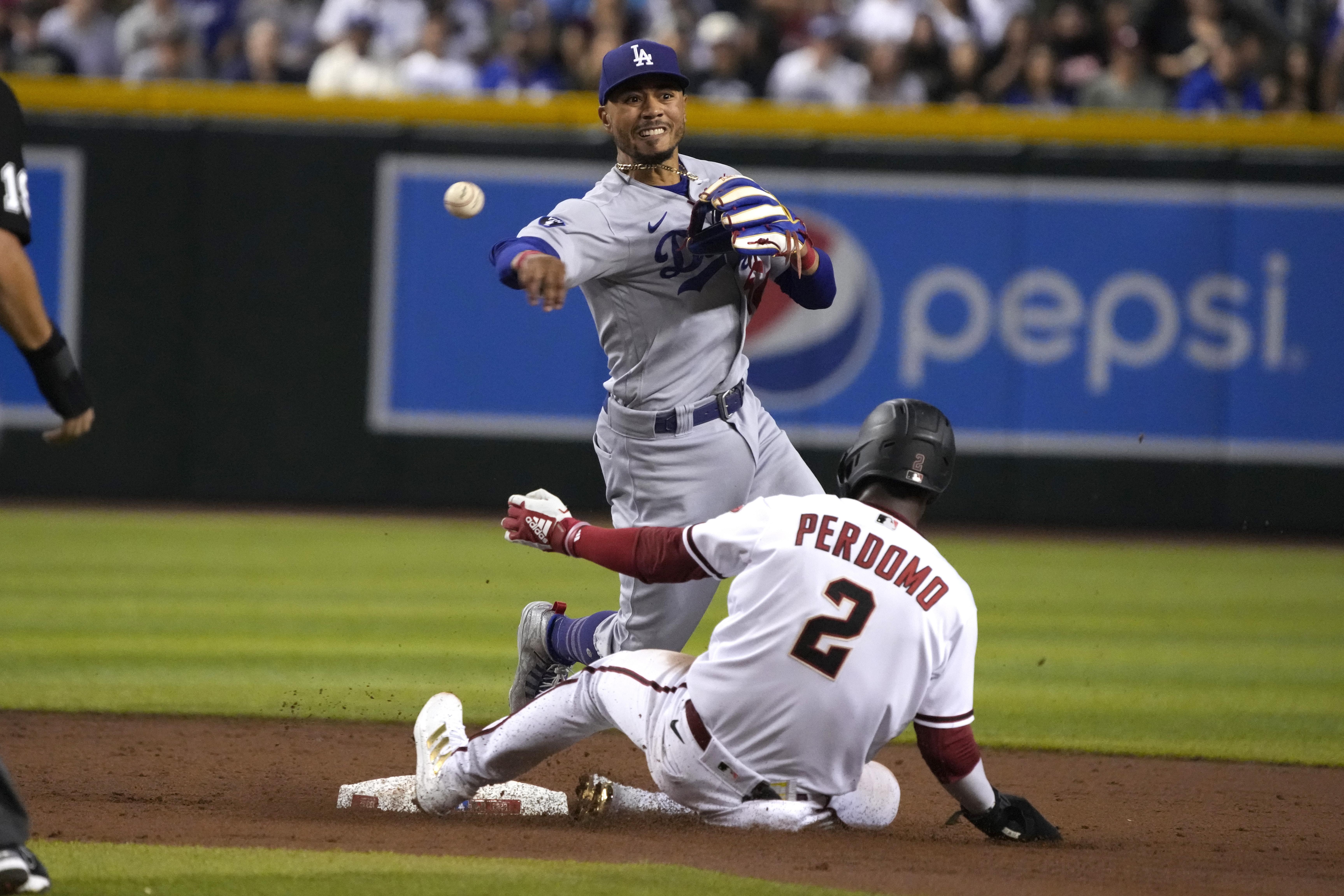 Dodgers' Mookie Betts is happy playing the infield, with