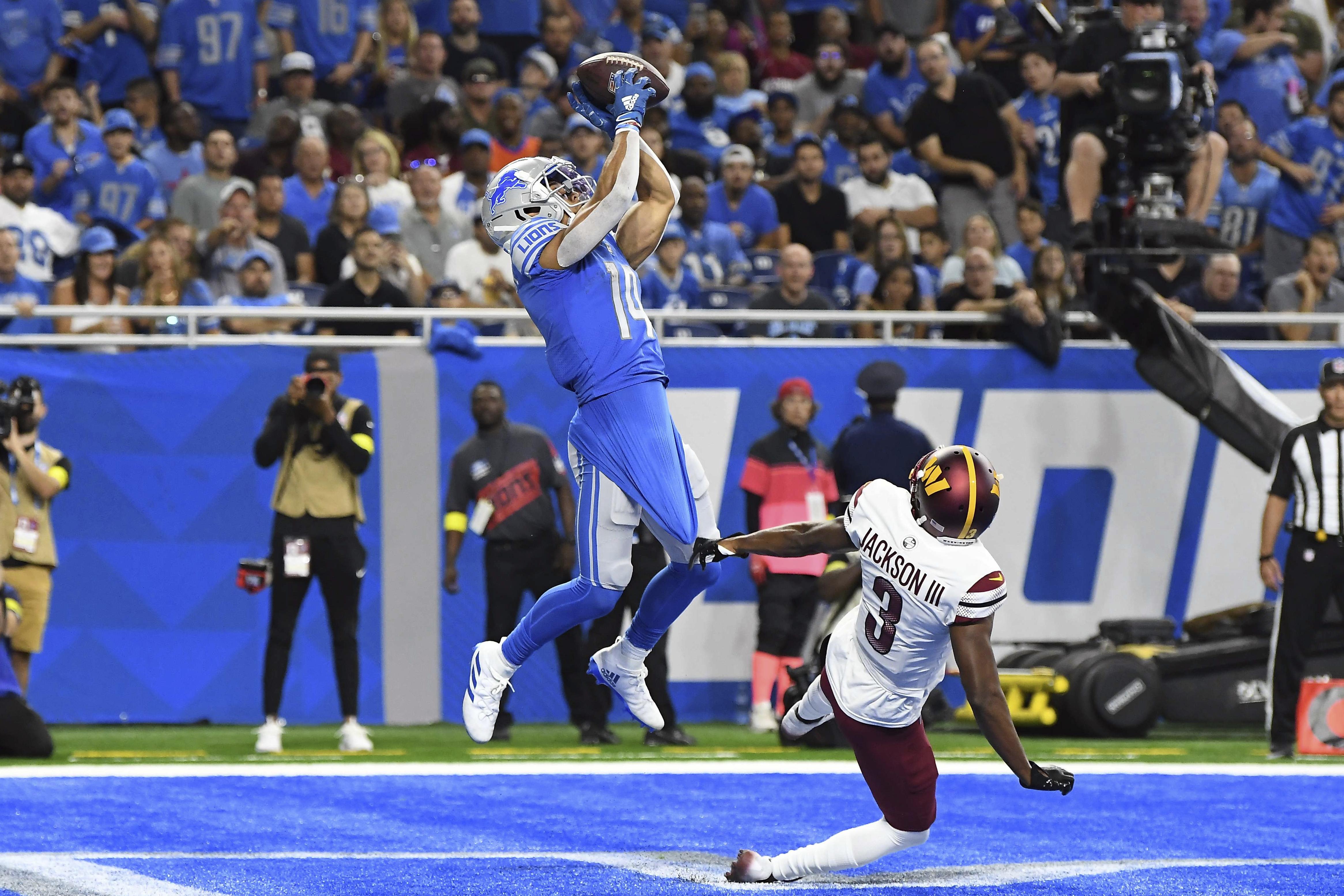 Detroit Lions wide receiver Tom Kennedy throws a 75-yard touchdown