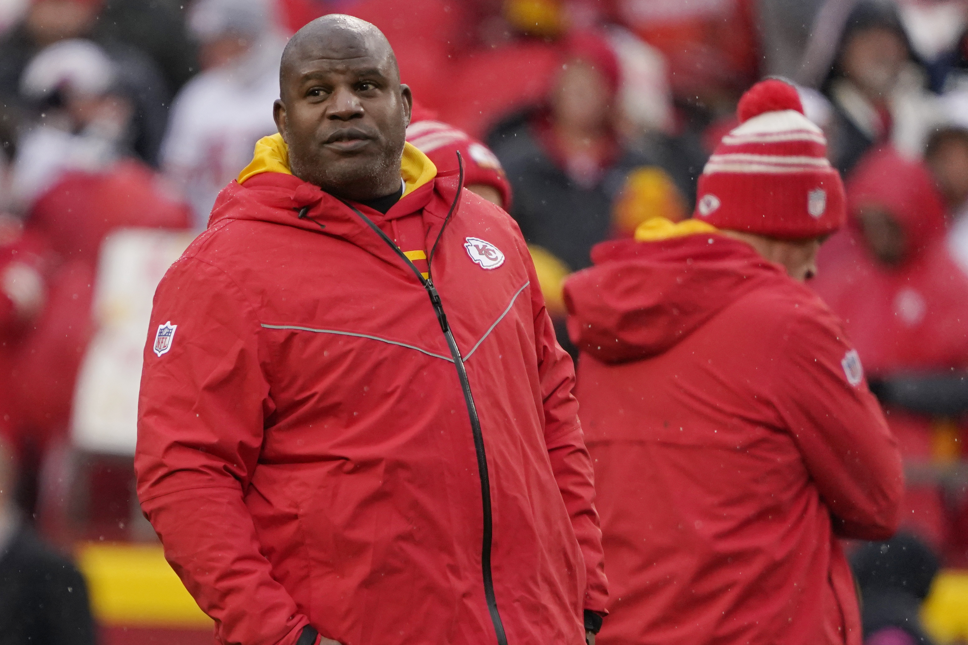 Kansas City Chiefs offensive coordinator Eric Bieniemy talks to