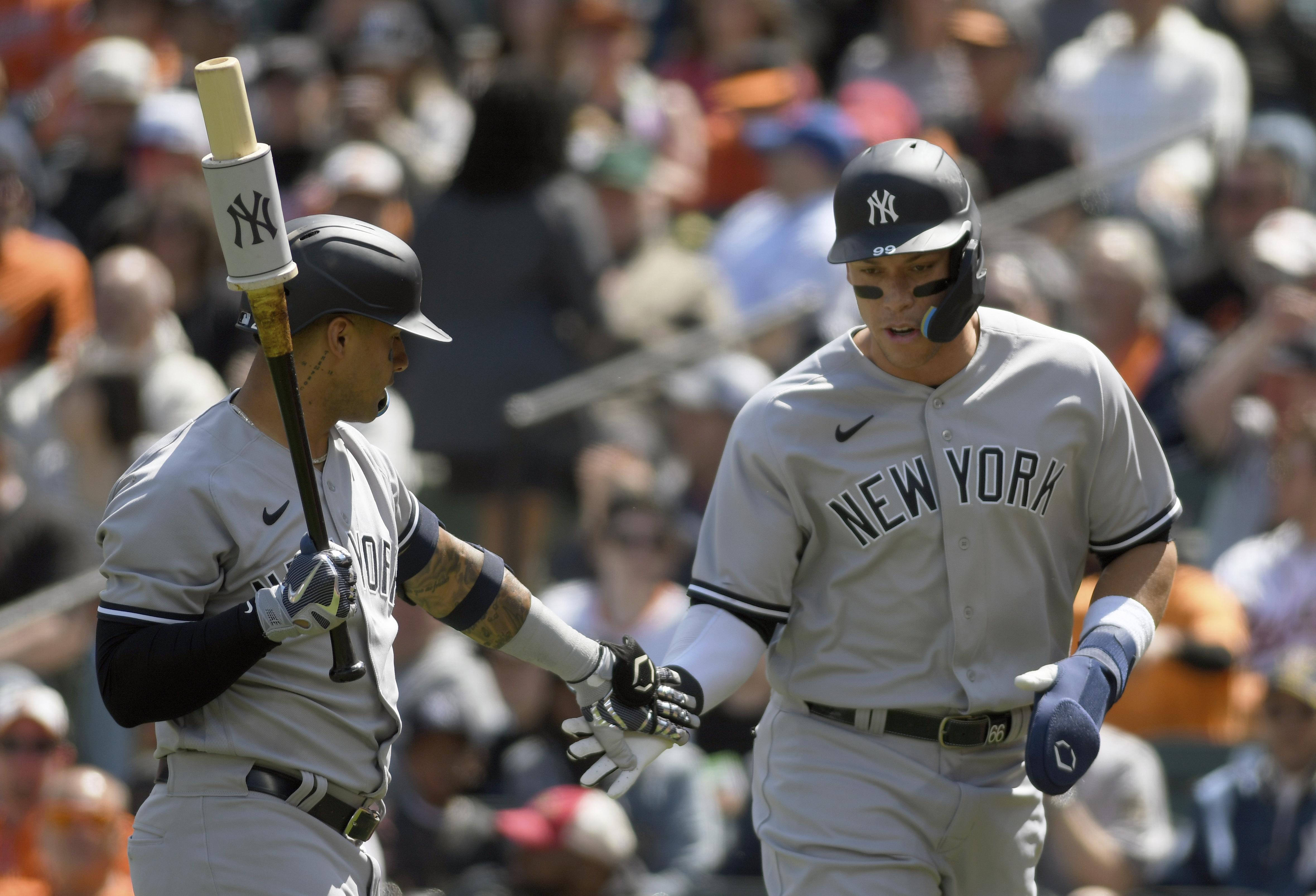 Cole gets 5th win, Yankees hit 3 HRs in 4-2 win at Texas