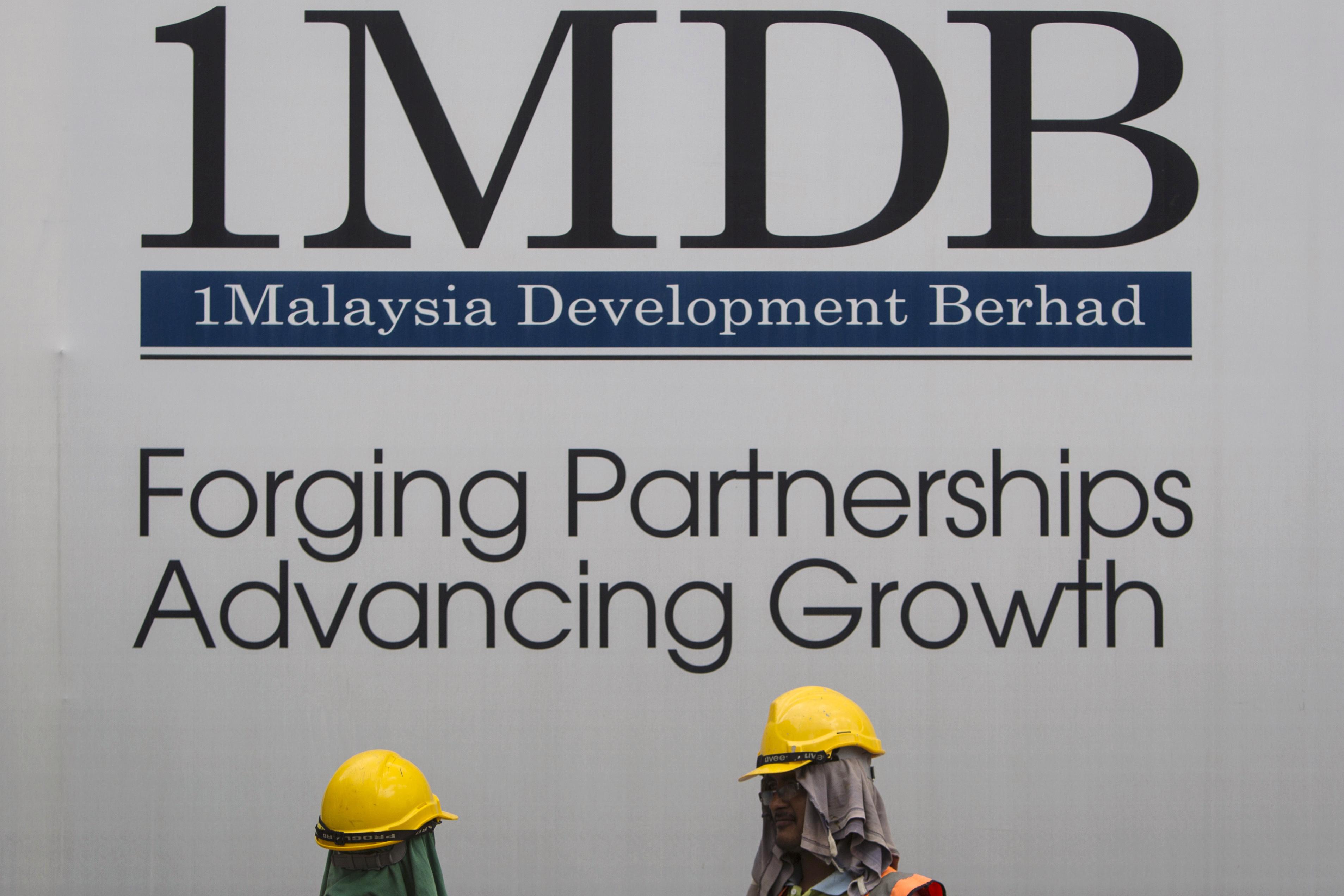 Swiss indict 2 managers of Saudi oil company in 1MDB scandal - Washington  Times