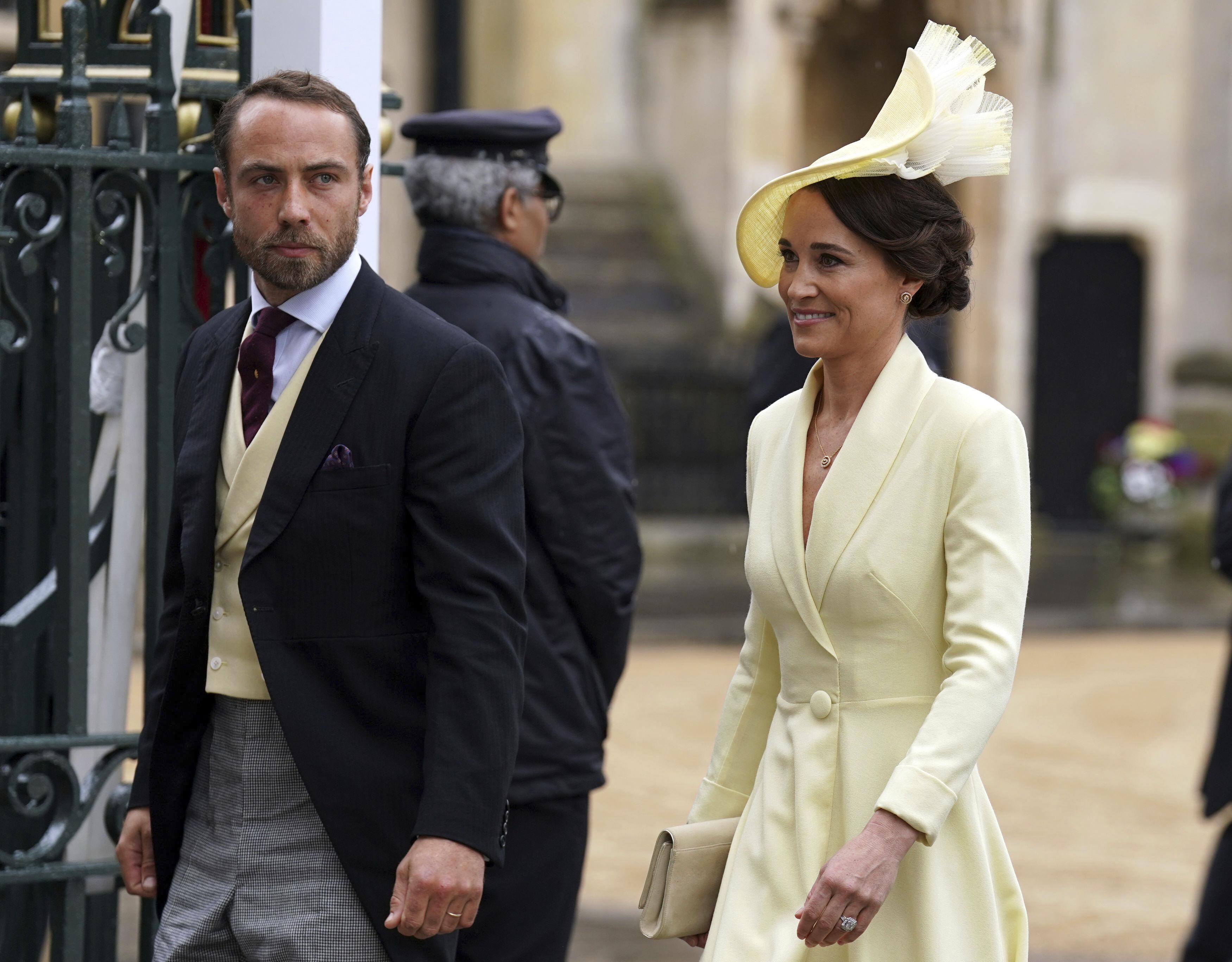 AP PHOTOS: Kentucky Derby hat styles: Bigger is often better