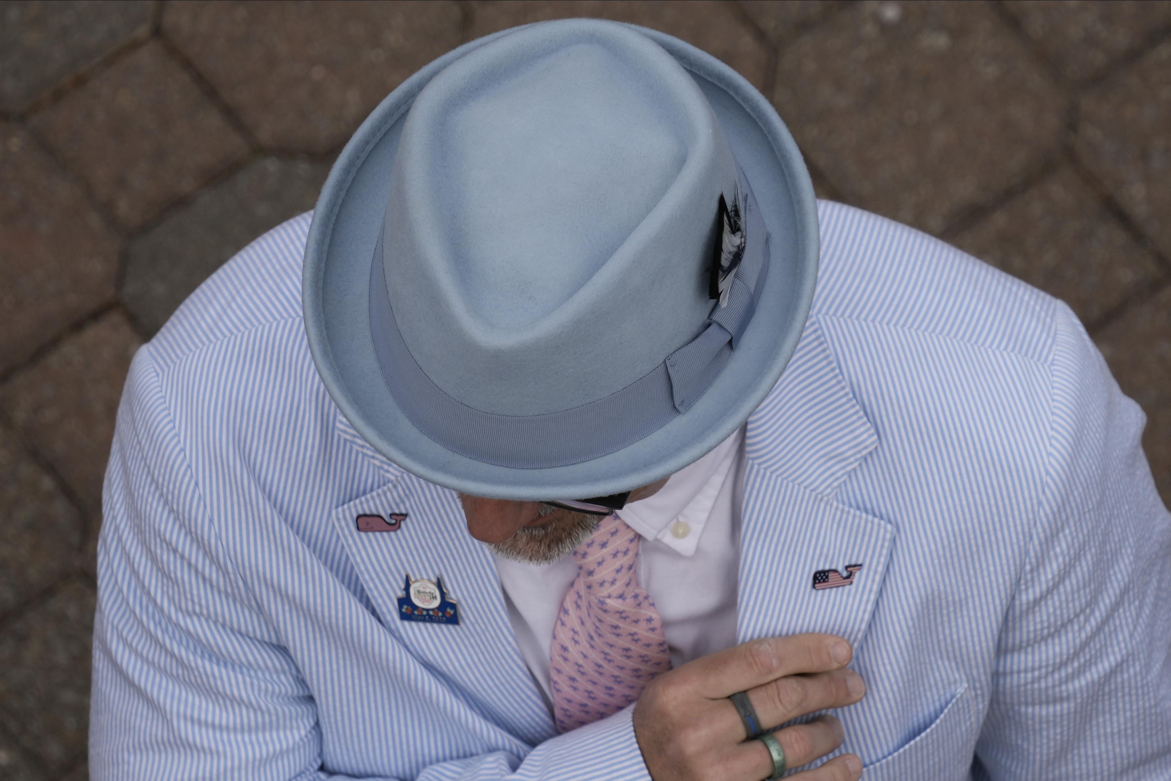 AP PHOTOS: Kentucky Derby hat styles: Bigger is often better